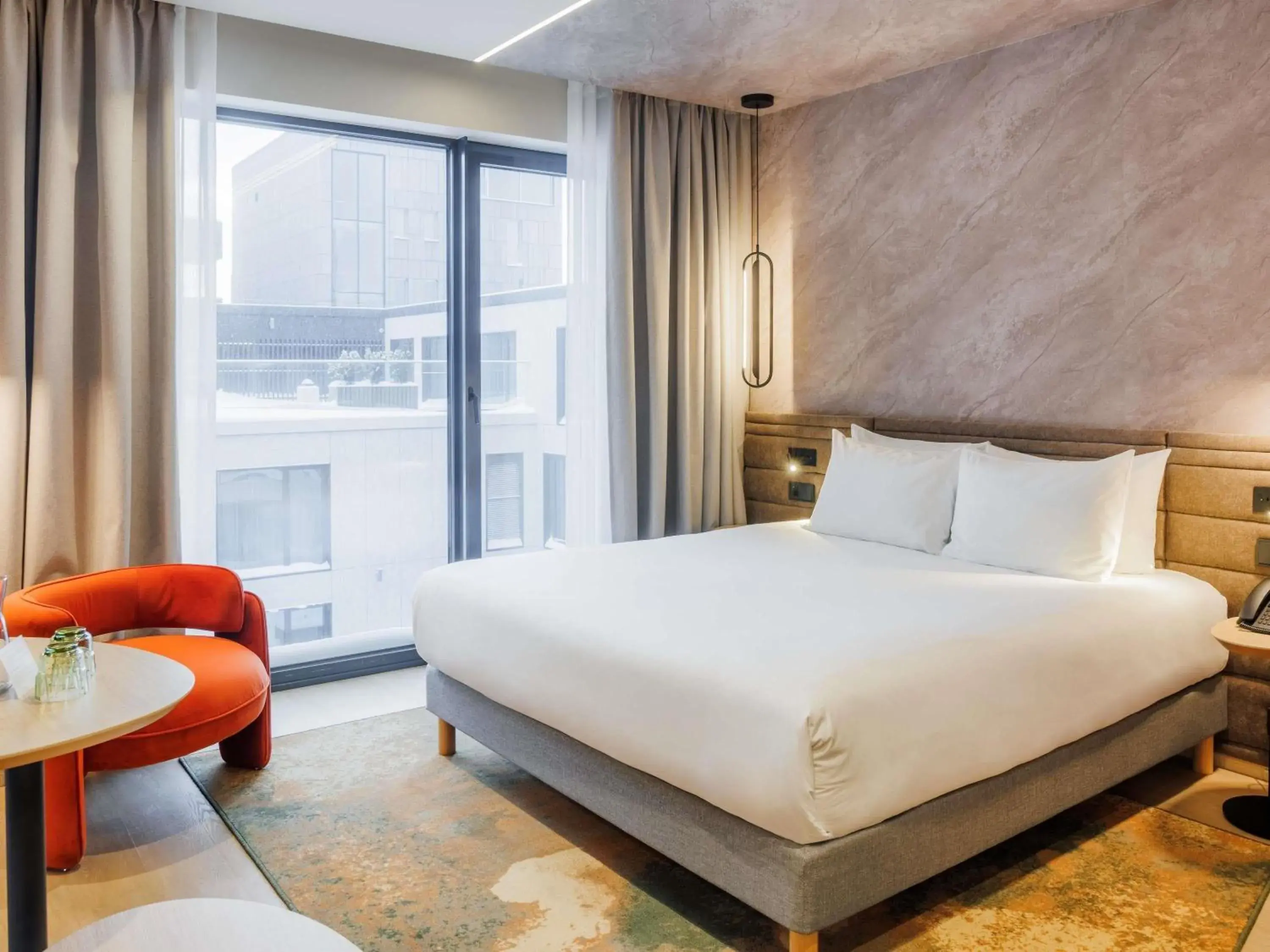 Deluxe Family Room with King Bed, Sofa and Old Town View in Novotel Tallinn Deluxe Family Room with King Bed, Sofa and Old Town View in Novotel Tallinn