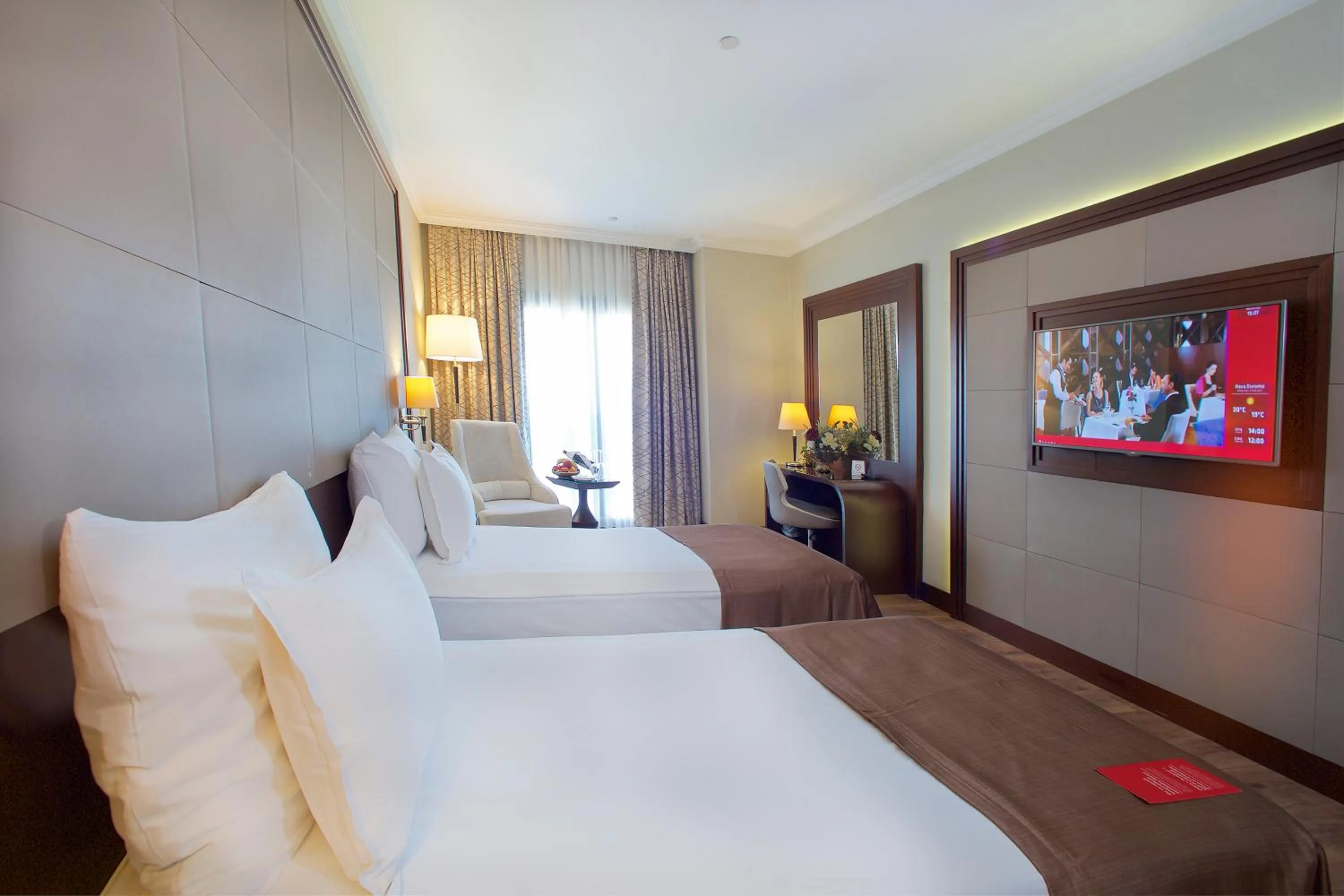 Communal lounge/ TV room, Bed in Ramada by Wyndham Istanbul Merter
