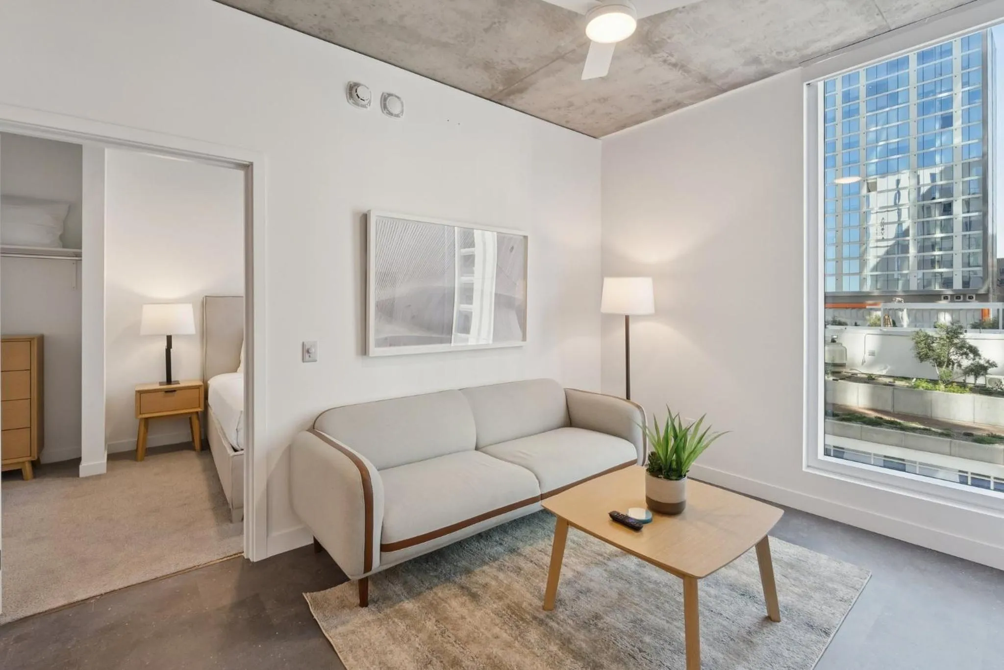 Living room, Bed in Placemakr Downtown Phoenix