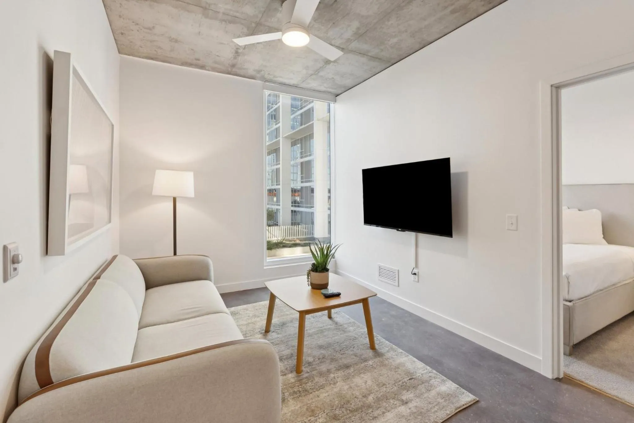 Living room, Bed in Placemakr Downtown Phoenix