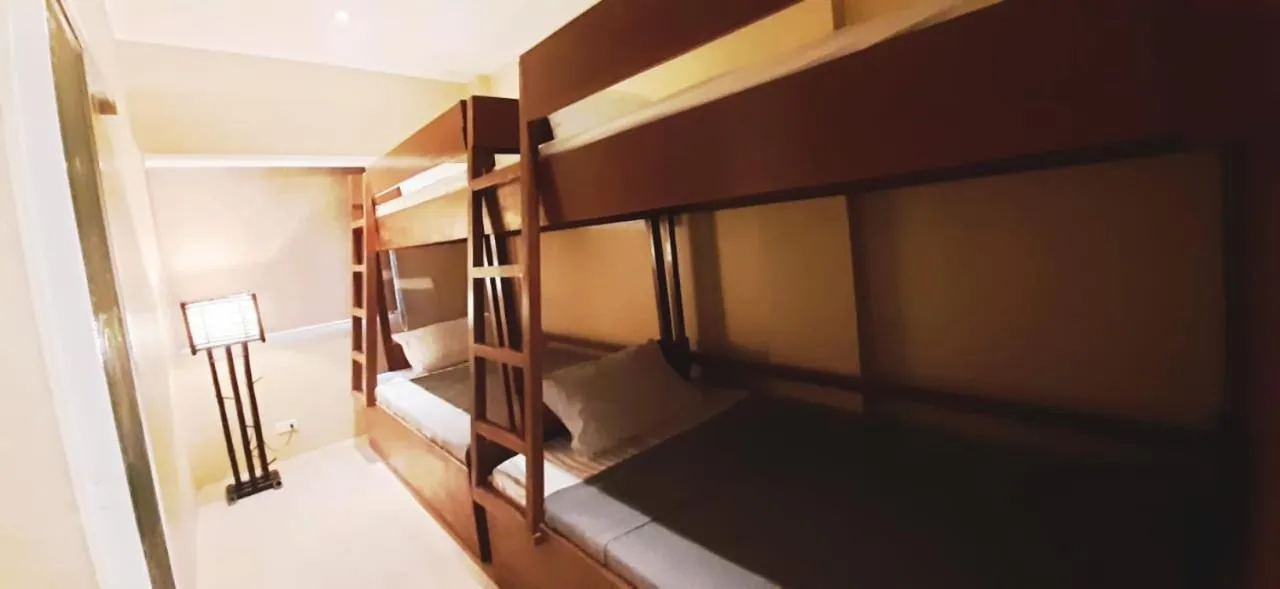 Bed in Amadeus and Isabel Inn