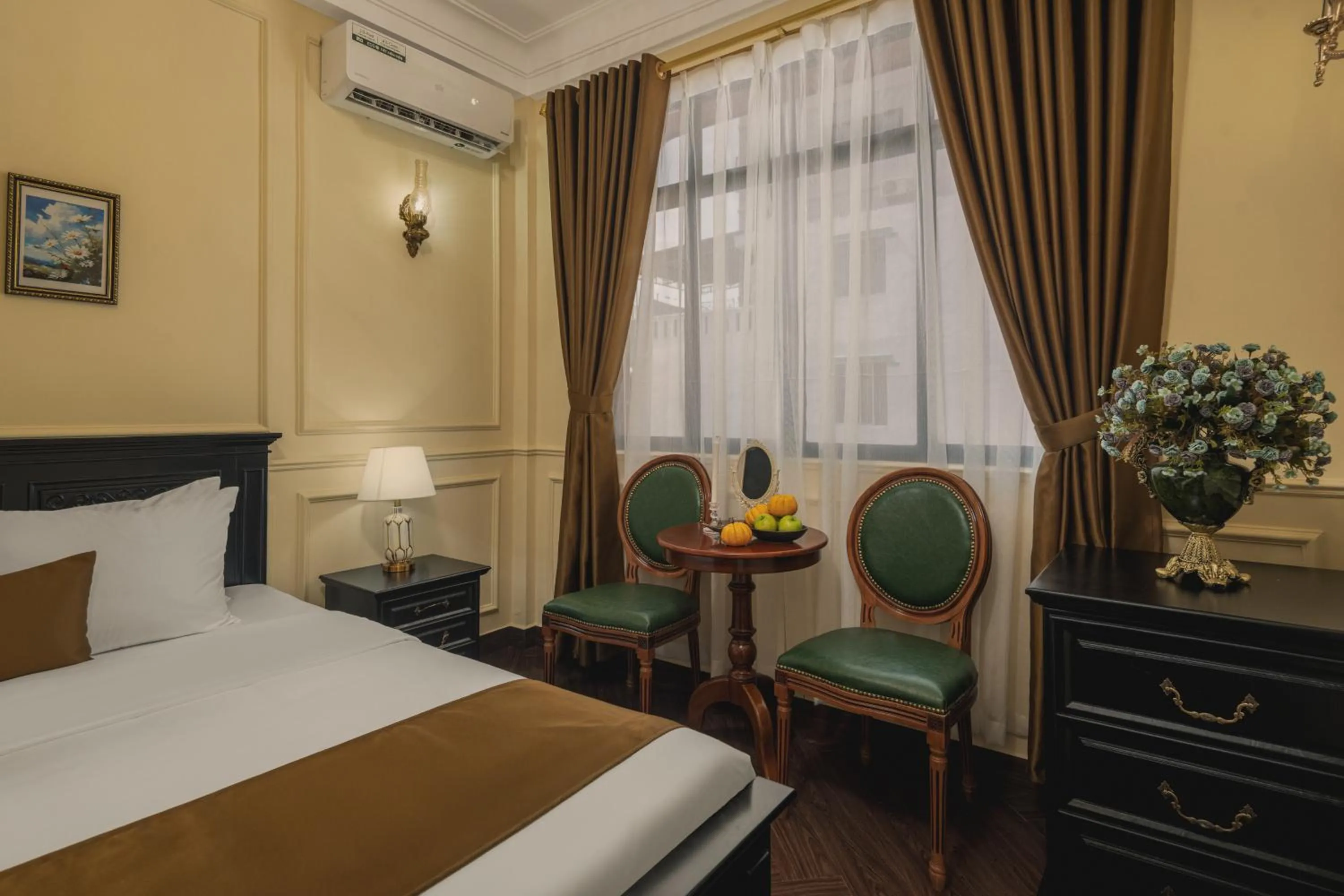 Bed in Vina Vintage Hotel