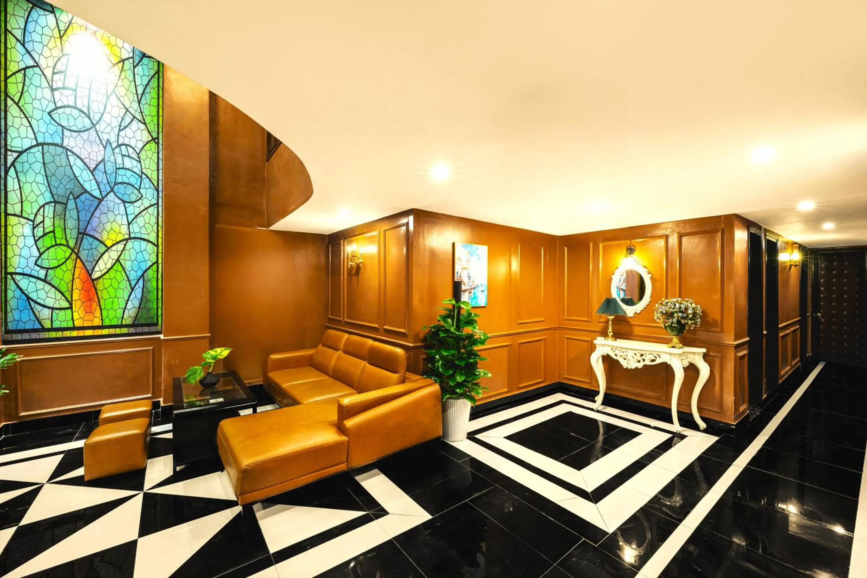 Communal lounge/ TV room in Vina Vintage Hotel