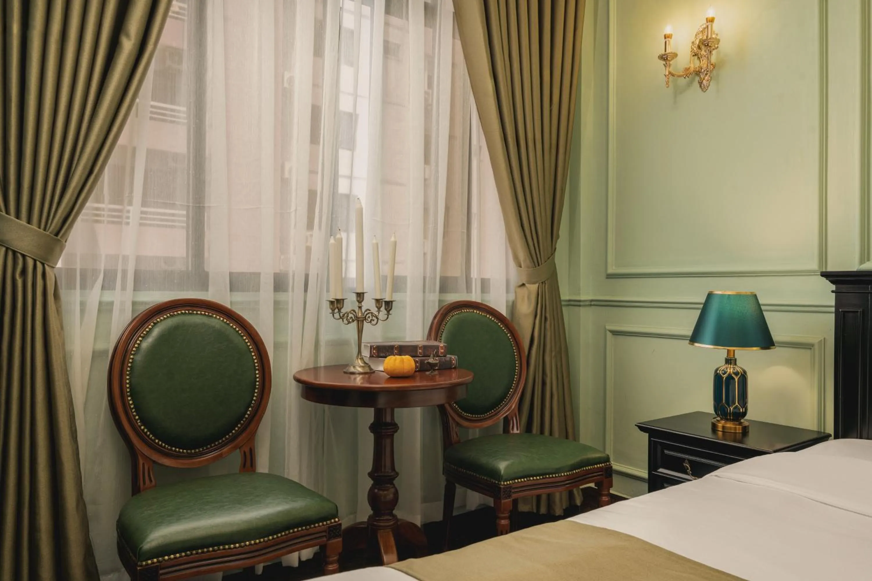 Bed in Vina Vintage Hotel