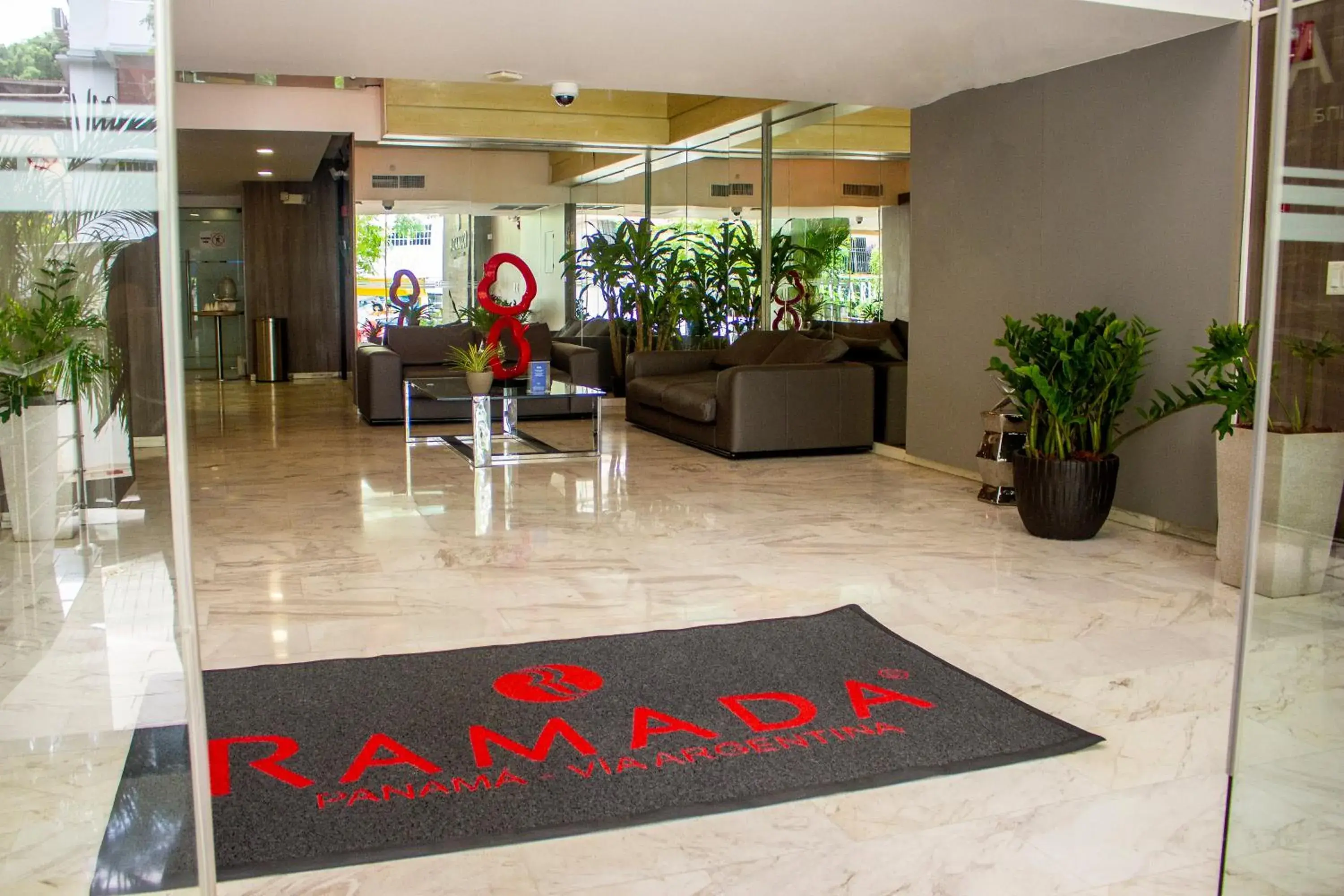 Lobby or reception in Ramada by Wyndham Panama Via Argentina Lobby or reception in Ramada by Wyndham Panama Via Argentina