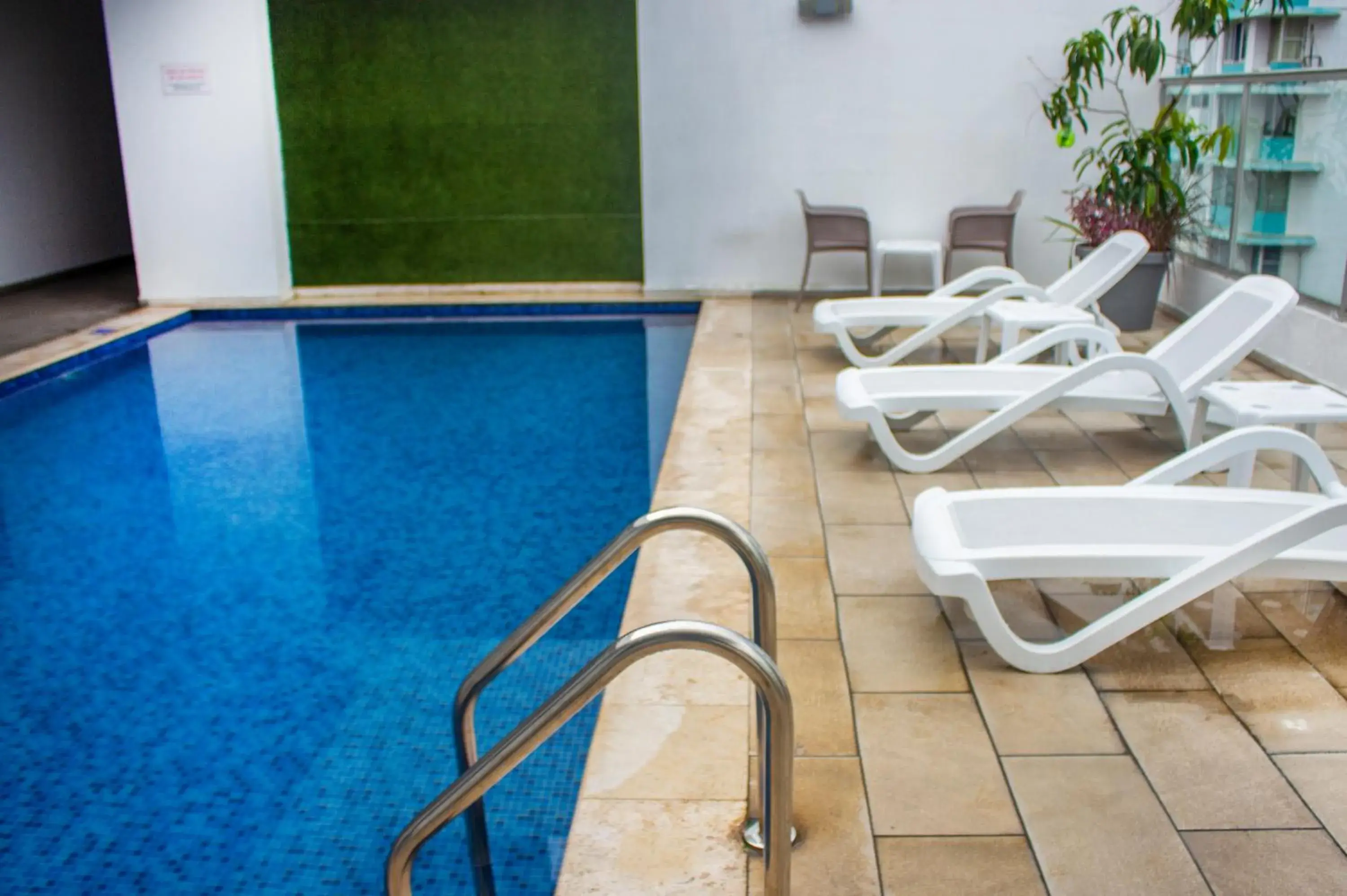 Swimming pool in Ramada by Wyndham Panama Via Argentina Swimming pool in Ramada by Wyndham Panama Via Argentina