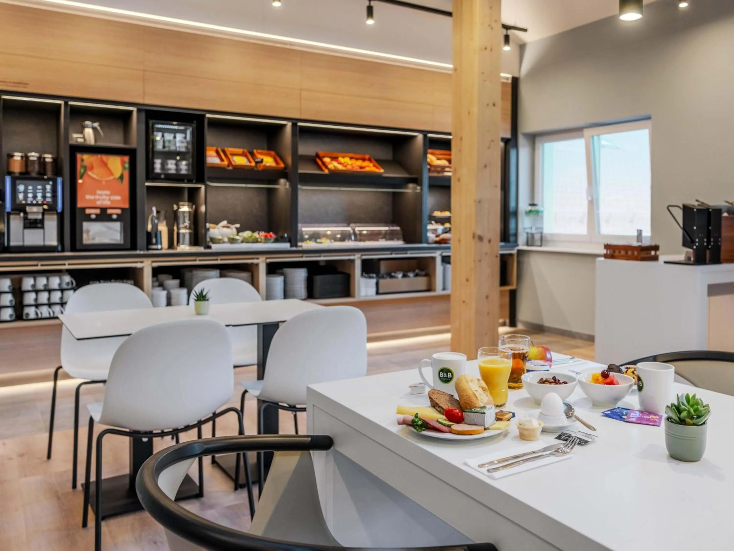 Lounge or bar in B&B HOTEL Mittenwald