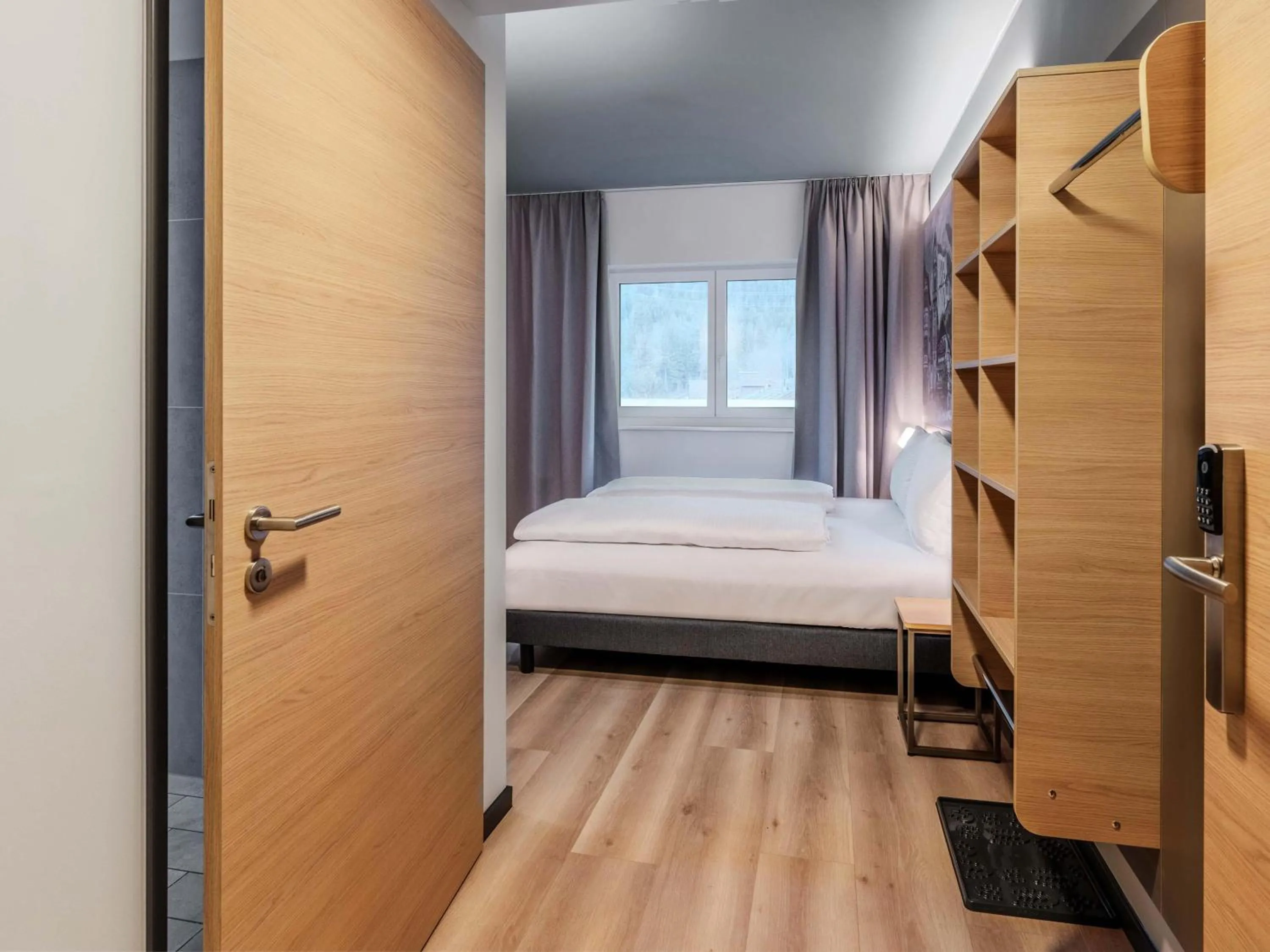 Photo of the whole room, Bed in B&B HOTEL Mittenwald