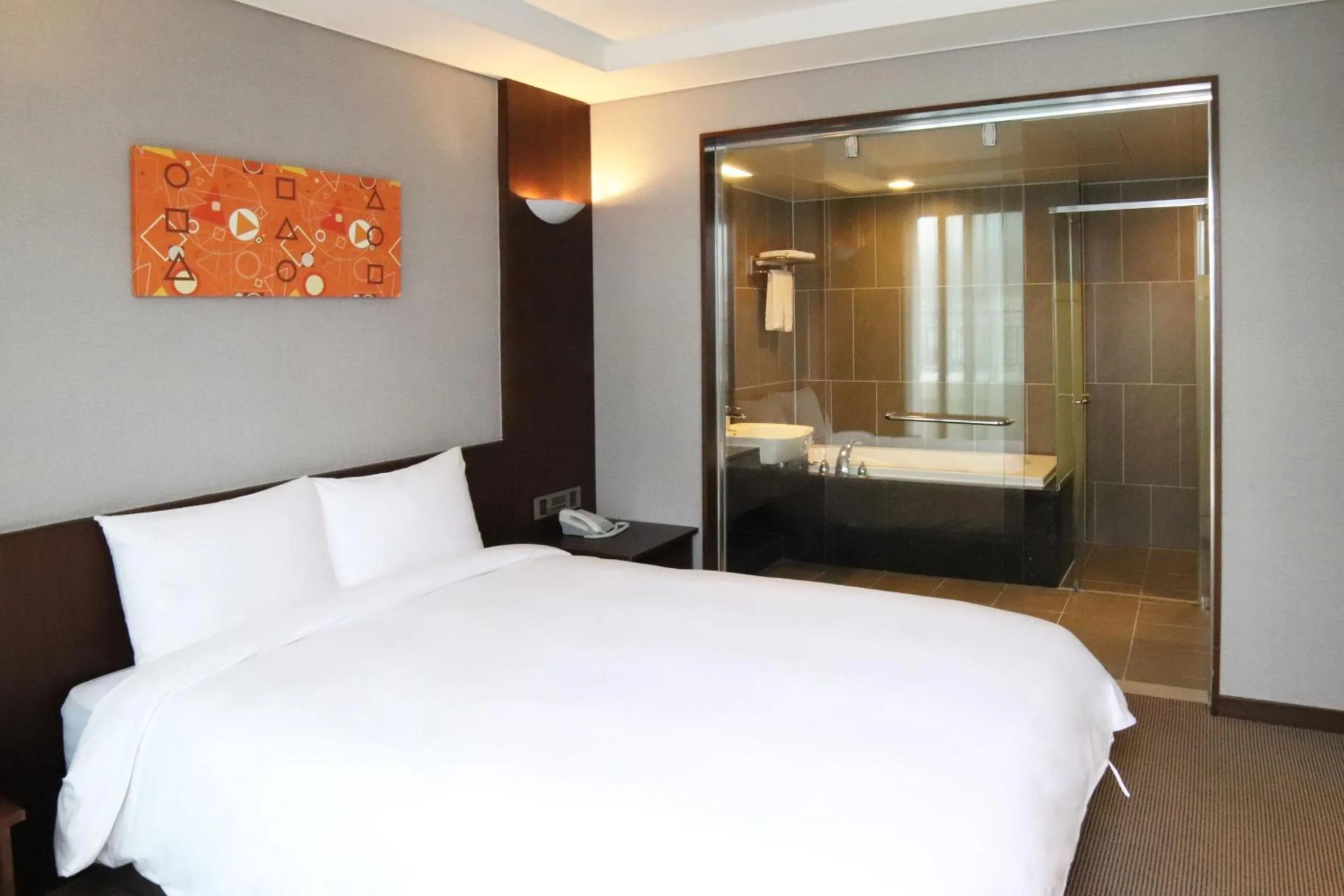 Bed in Mstay Hotel
