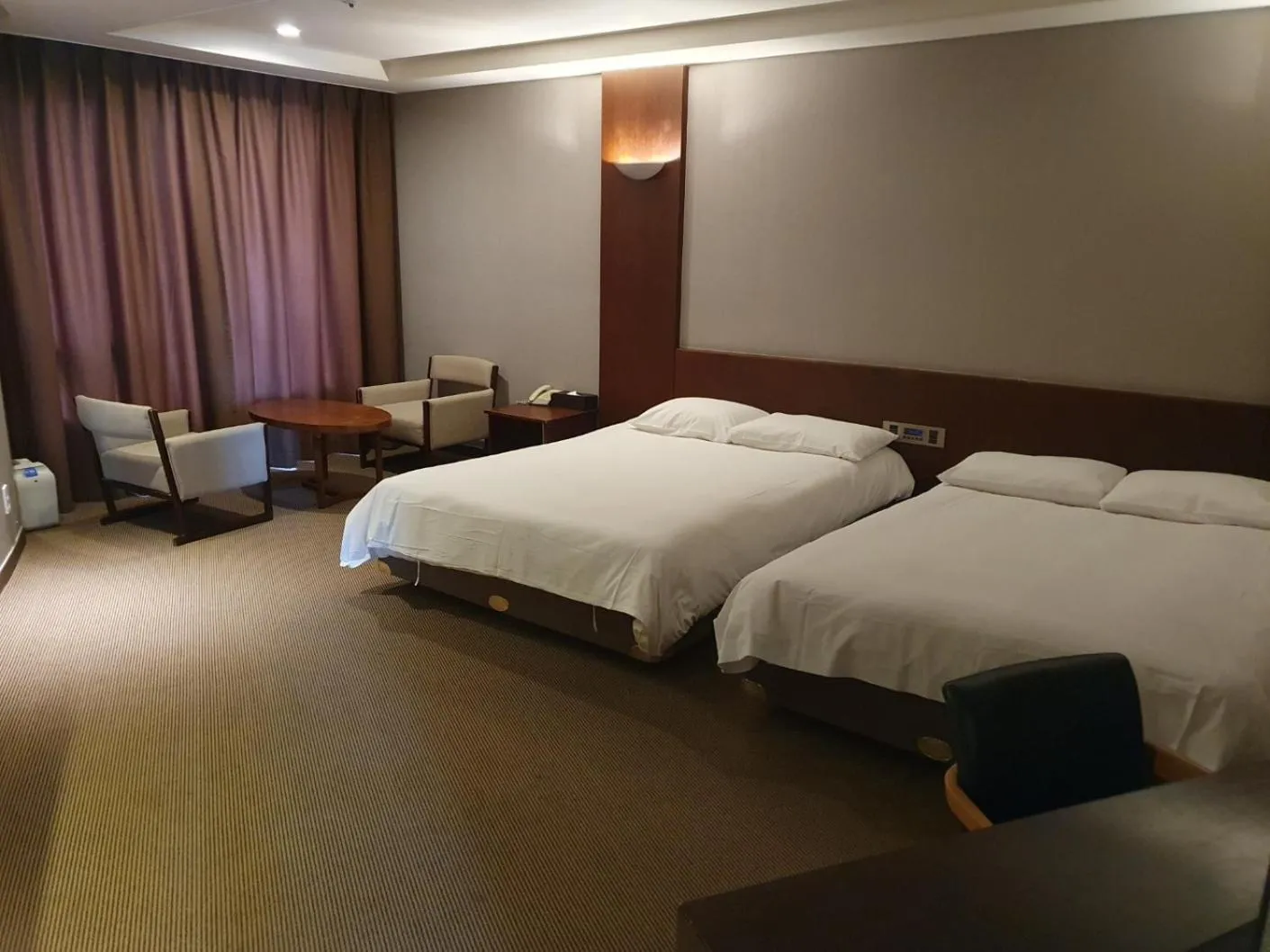 Bed in Mstay Hotel