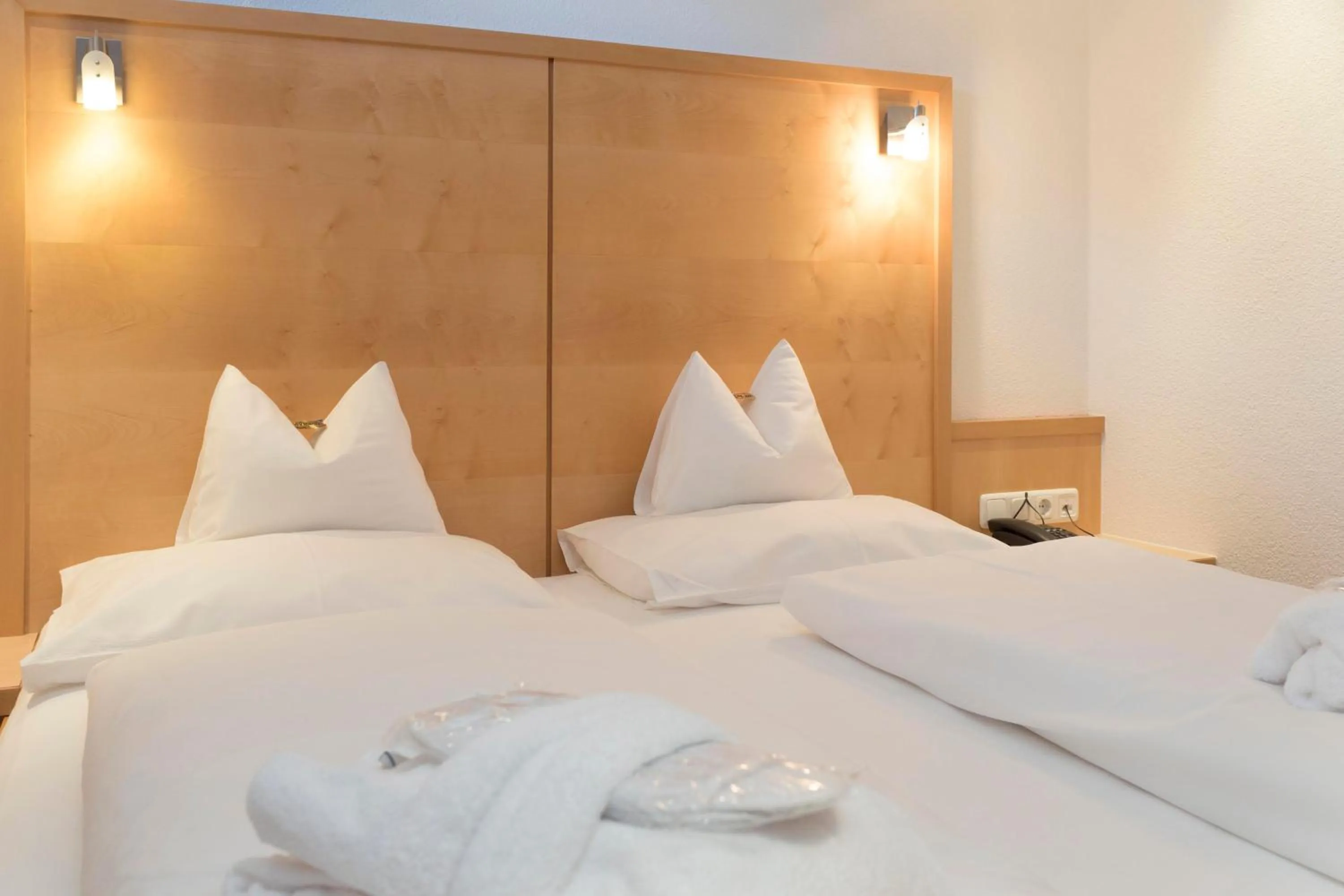 Bed in Hotel Garni Passeier