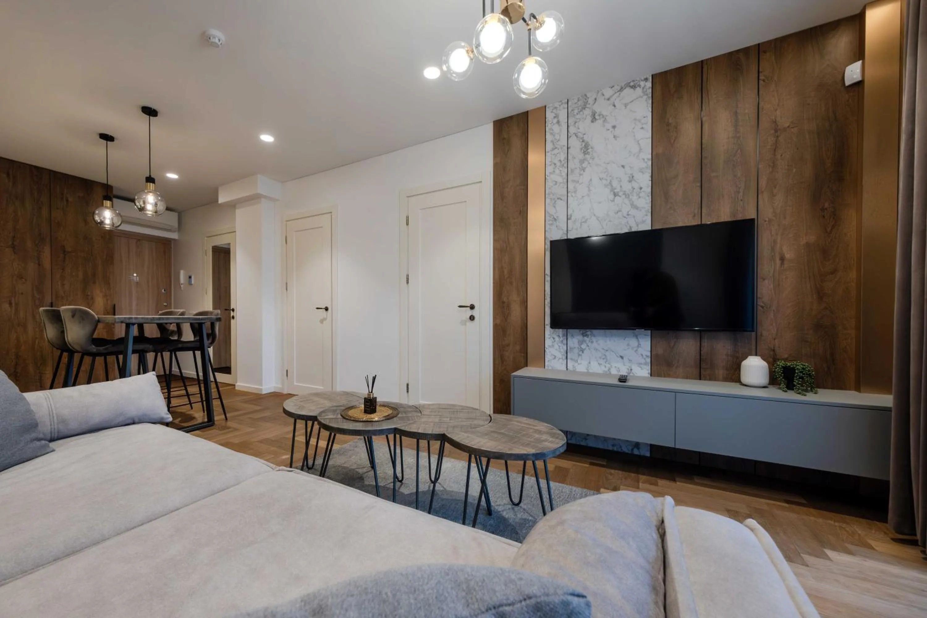 Communal lounge/ TV room, Bed in King Mindaugas Apartments