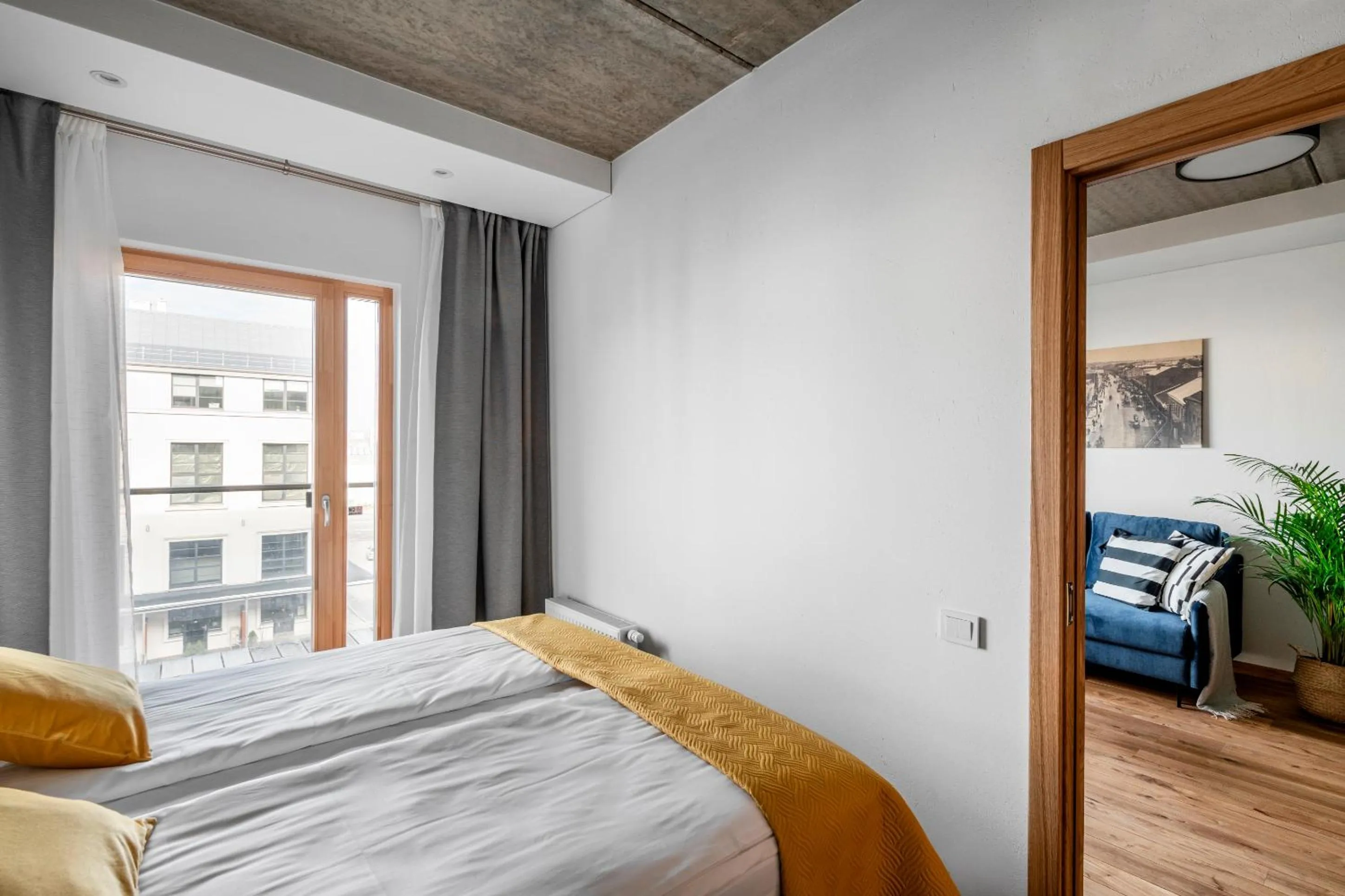 Bed in King Mindaugas Apartments