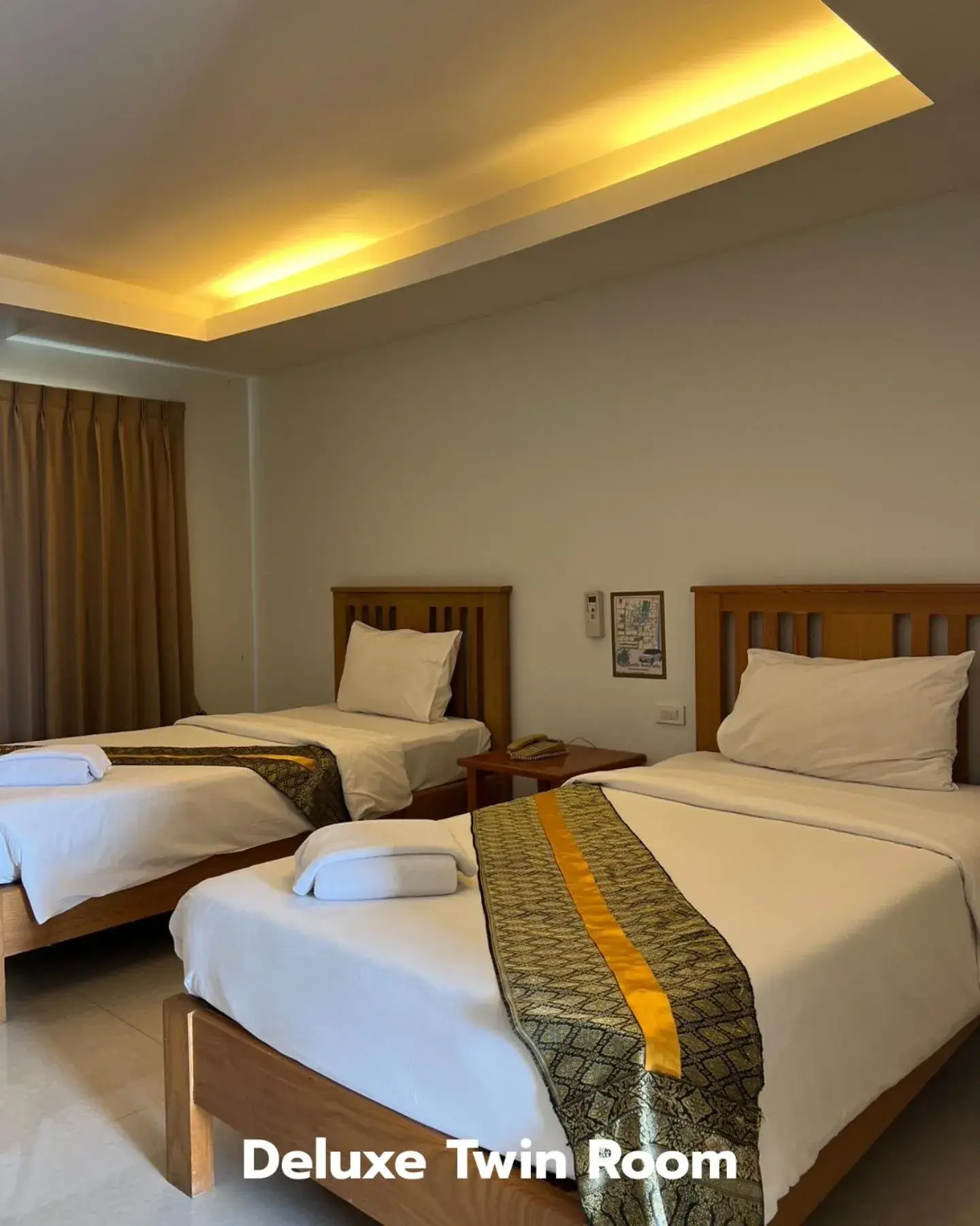 Bed in That Phanom River View Hotel Bed in That Phanom River View Hotel