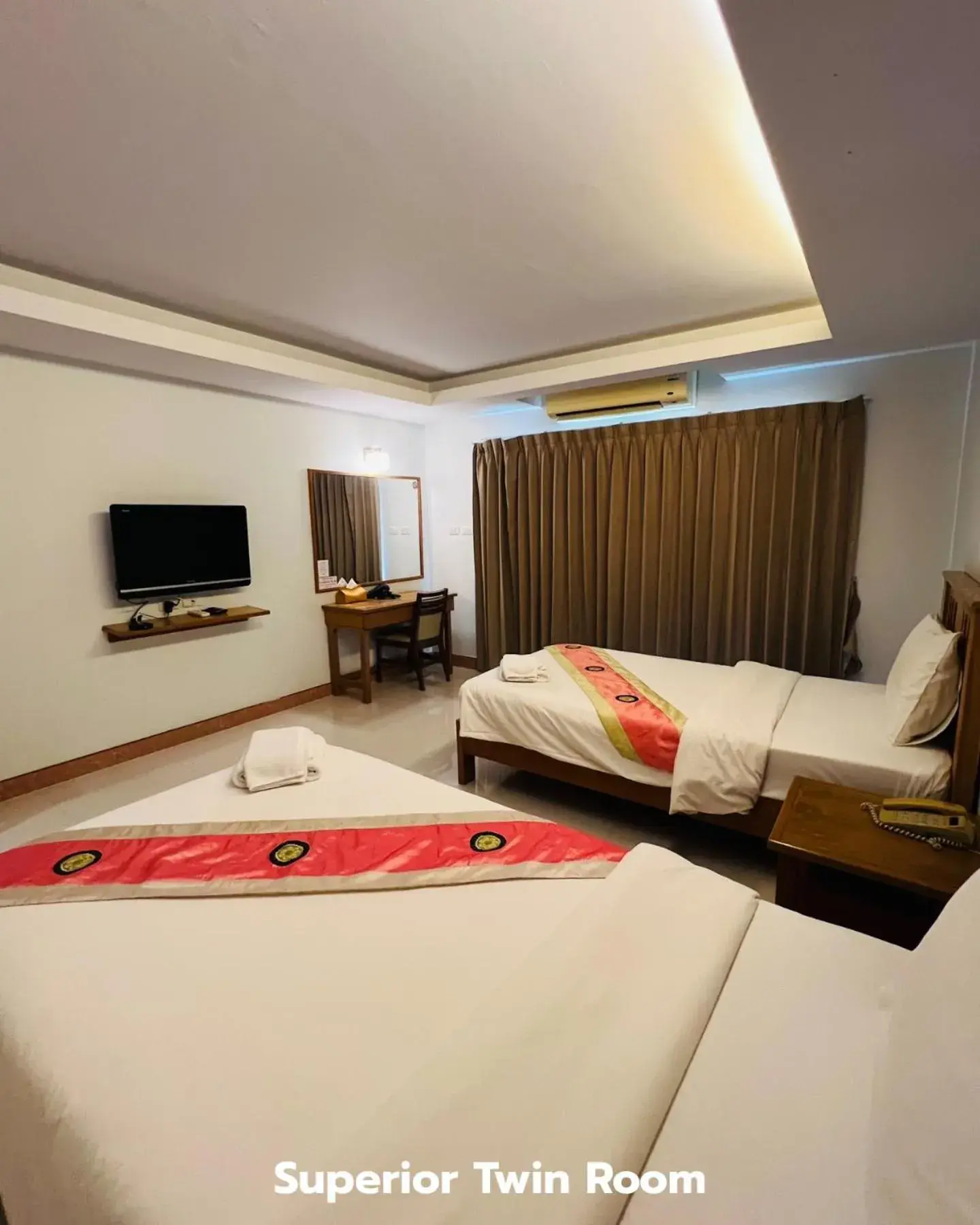 Bed in That Phanom River View Hotel Bed in That Phanom River View Hotel