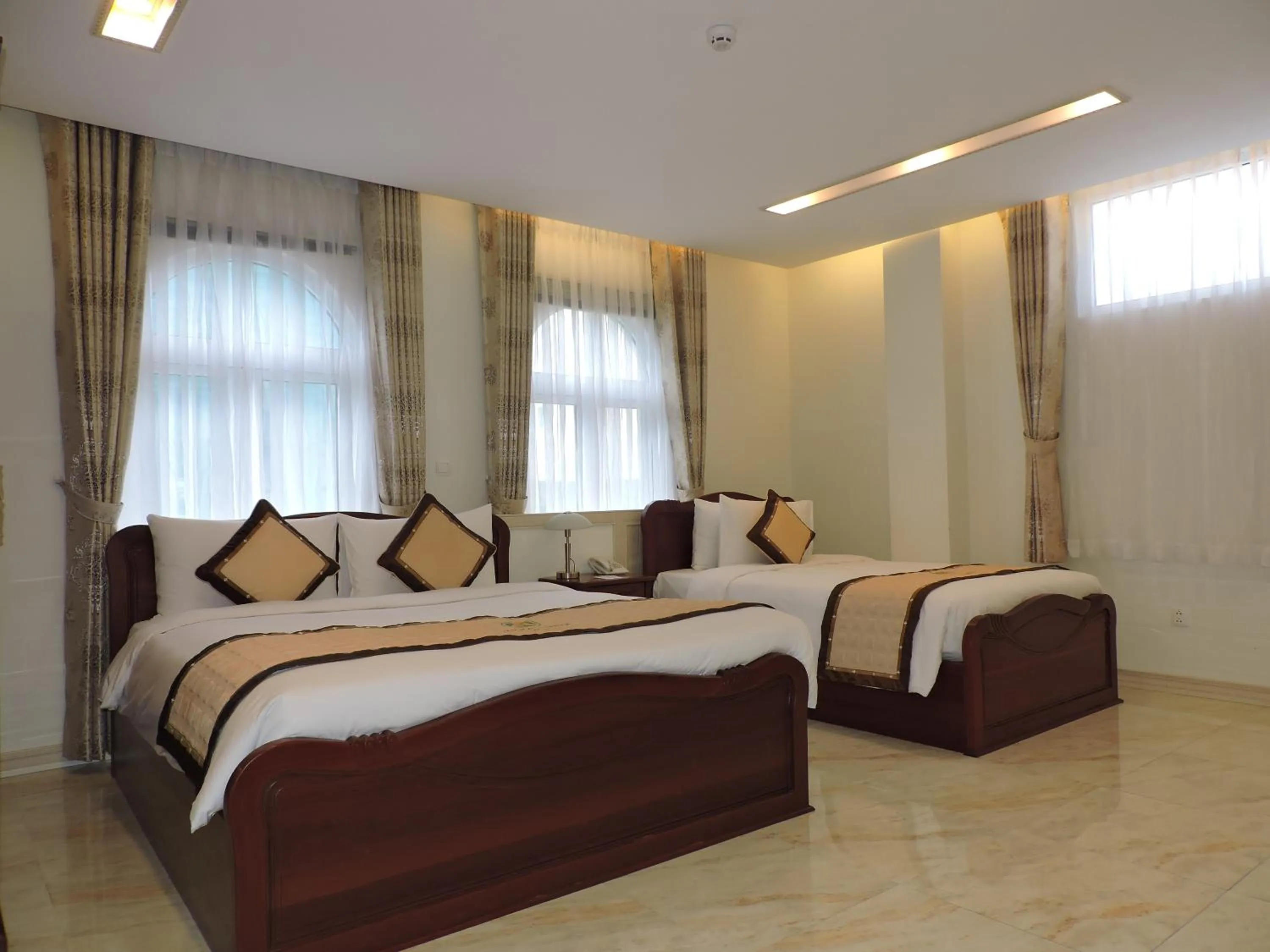 Photo of the whole room, Bed in Minh Tam Phu Nhuan Hotel & Spa
