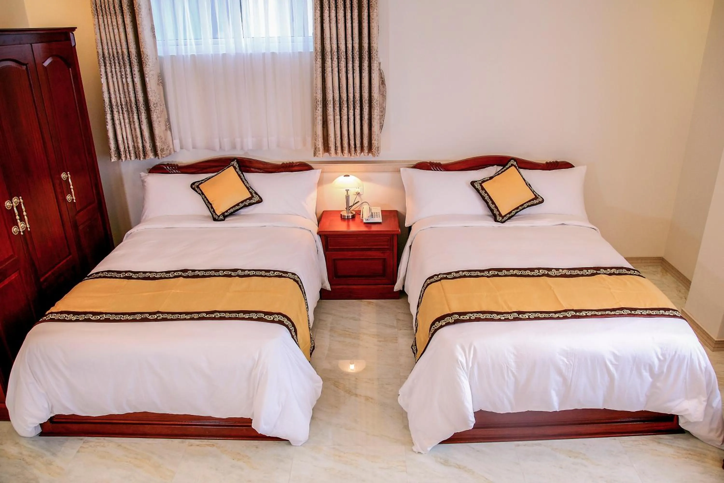 Bed in Minh Tam Phu Nhuan Hotel & Spa