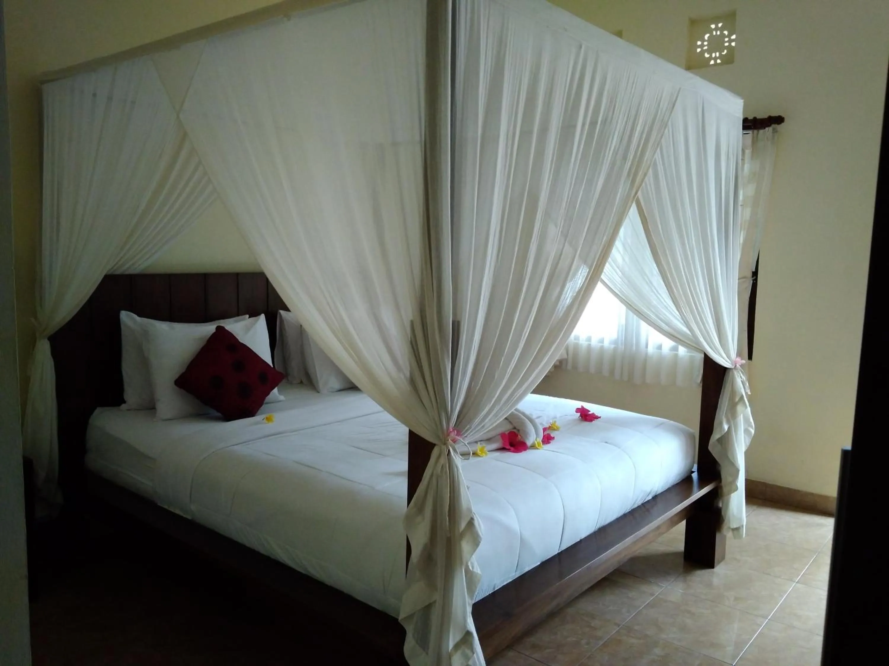 Bed in Kartika Bungalows