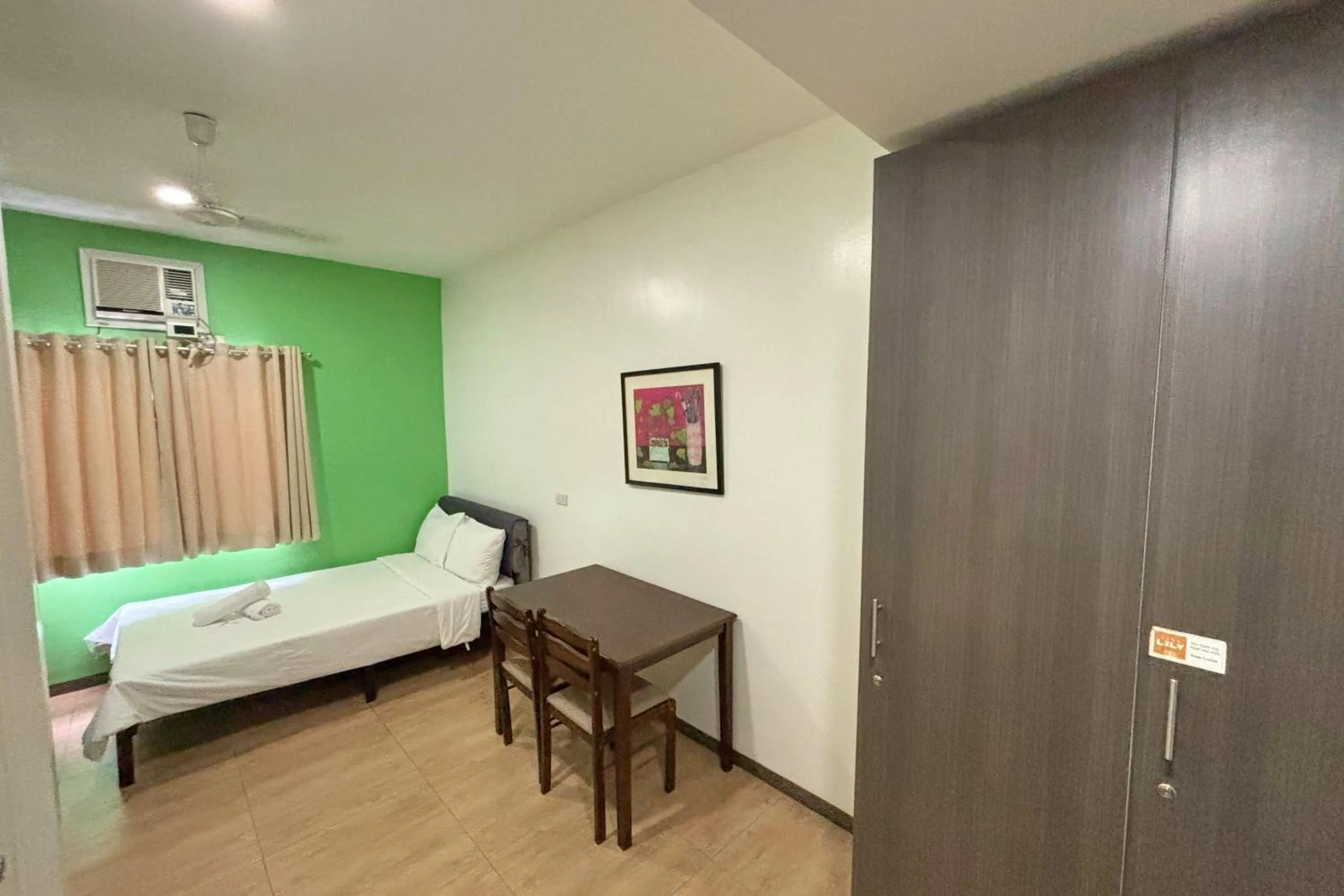 Bed in Casa Lily Quezon City