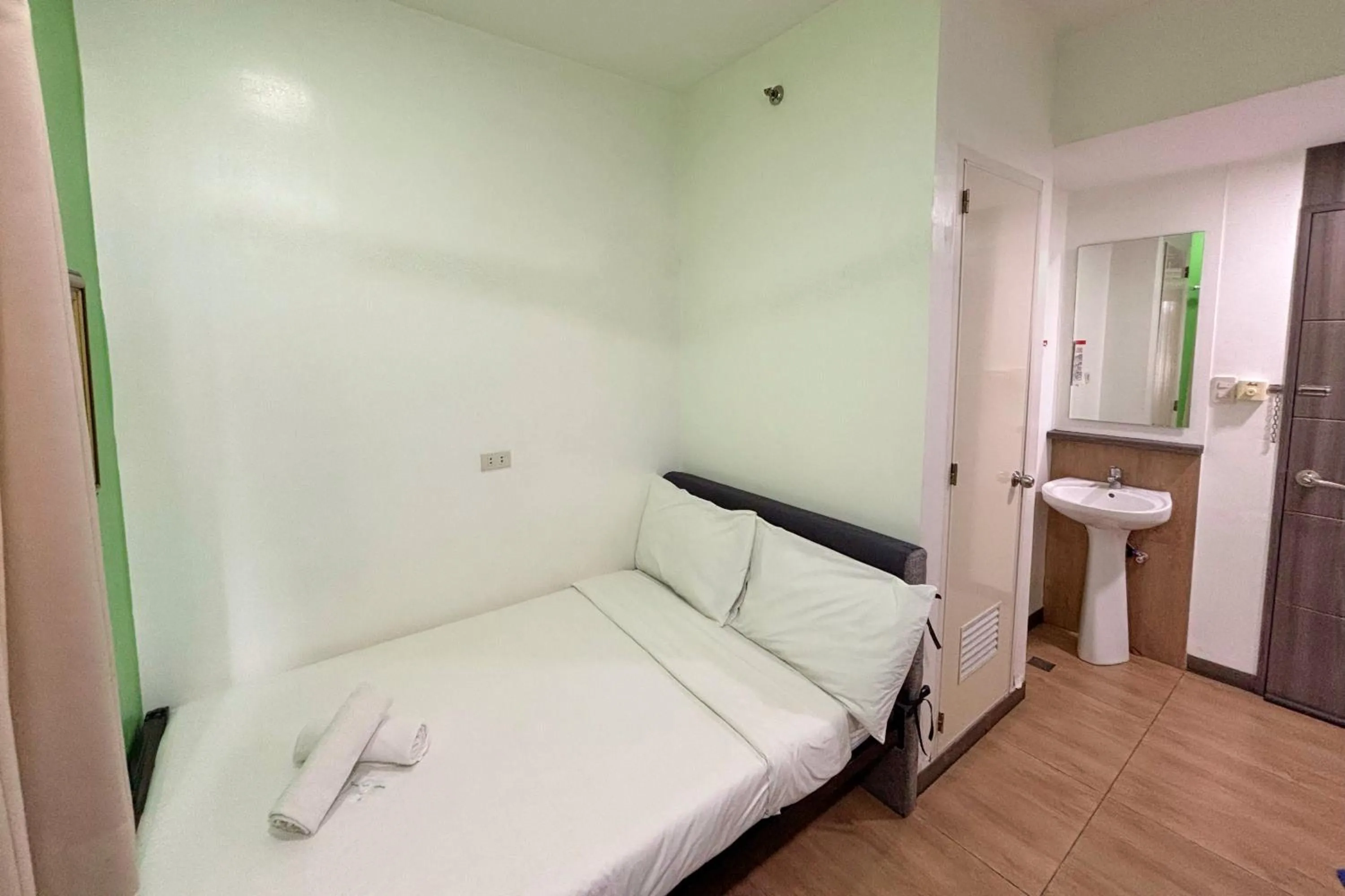 Bed in Casa Lily Quezon City