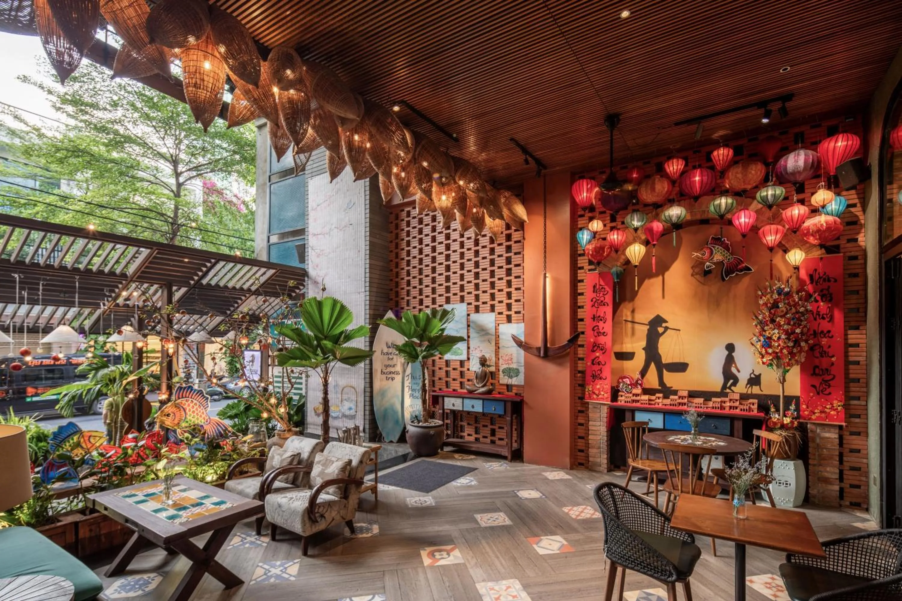 Communal lounge/ TV room in Tropical Dorm Hostel Da Nang by Haviland