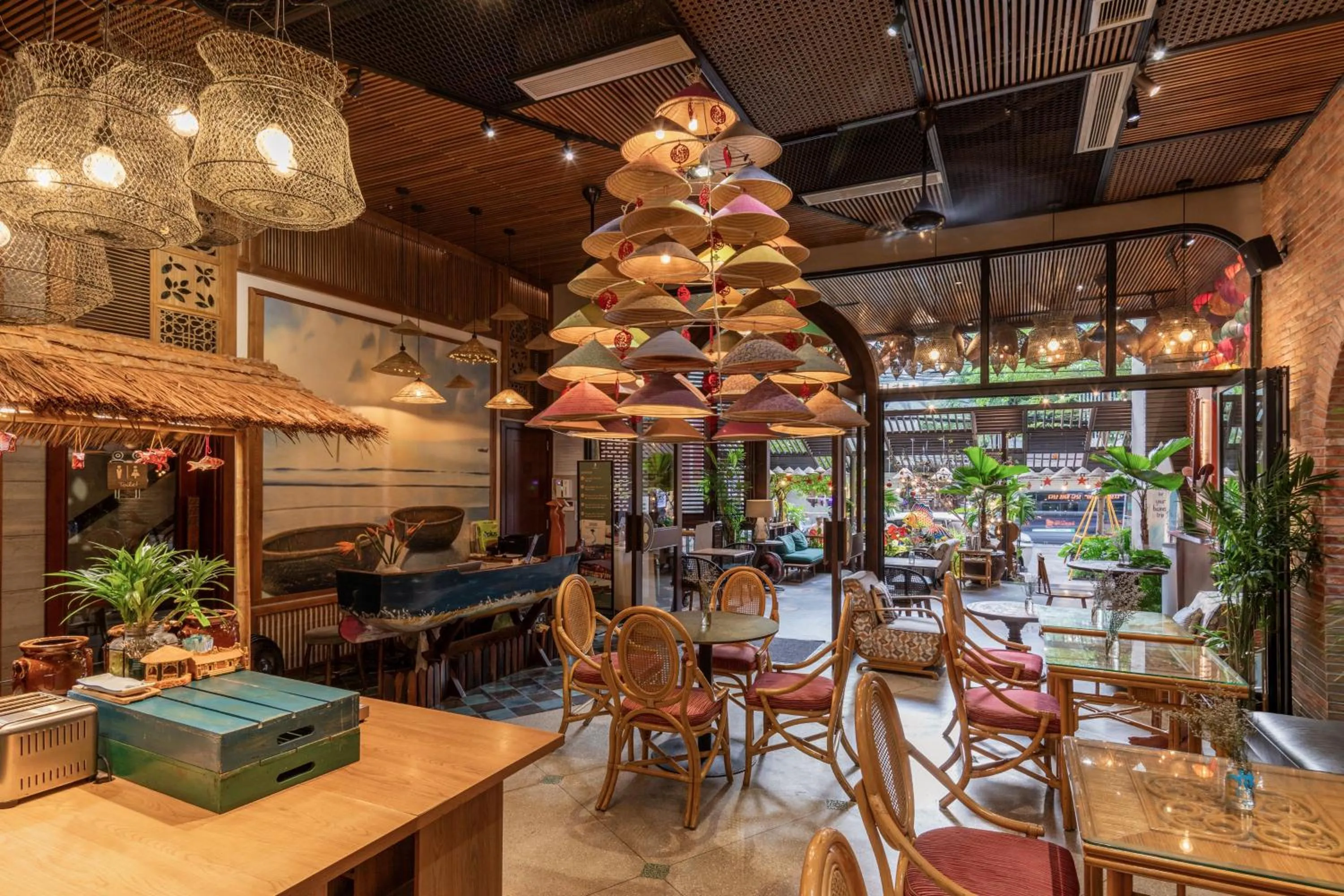 Communal lounge/ TV room in Tropical Dorm Hostel Da Nang by Haviland