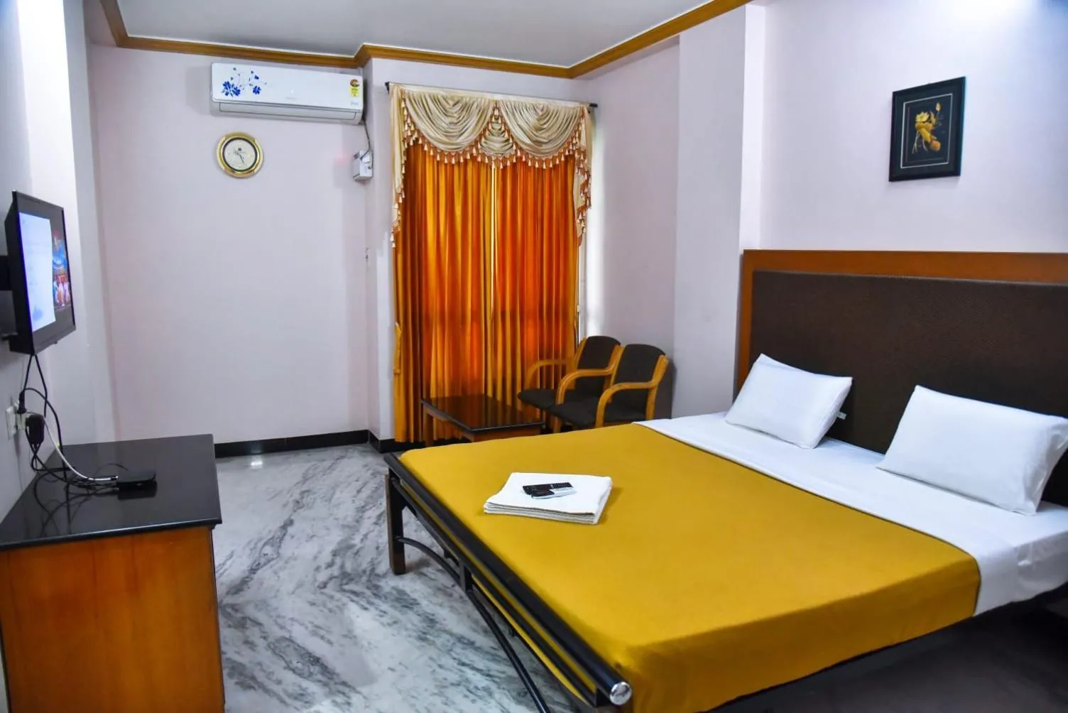 Bed in Hotel Grand Palace