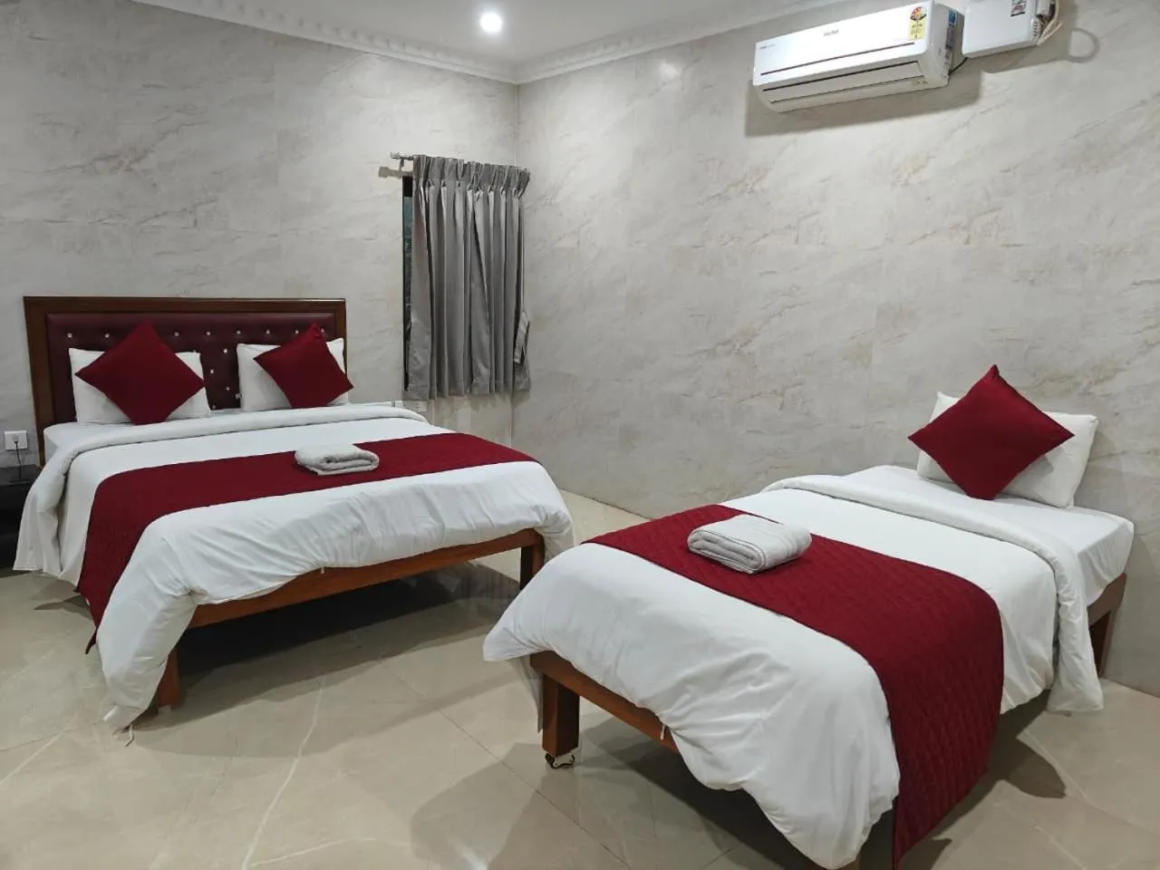 Bed in Hotel Grand Palace