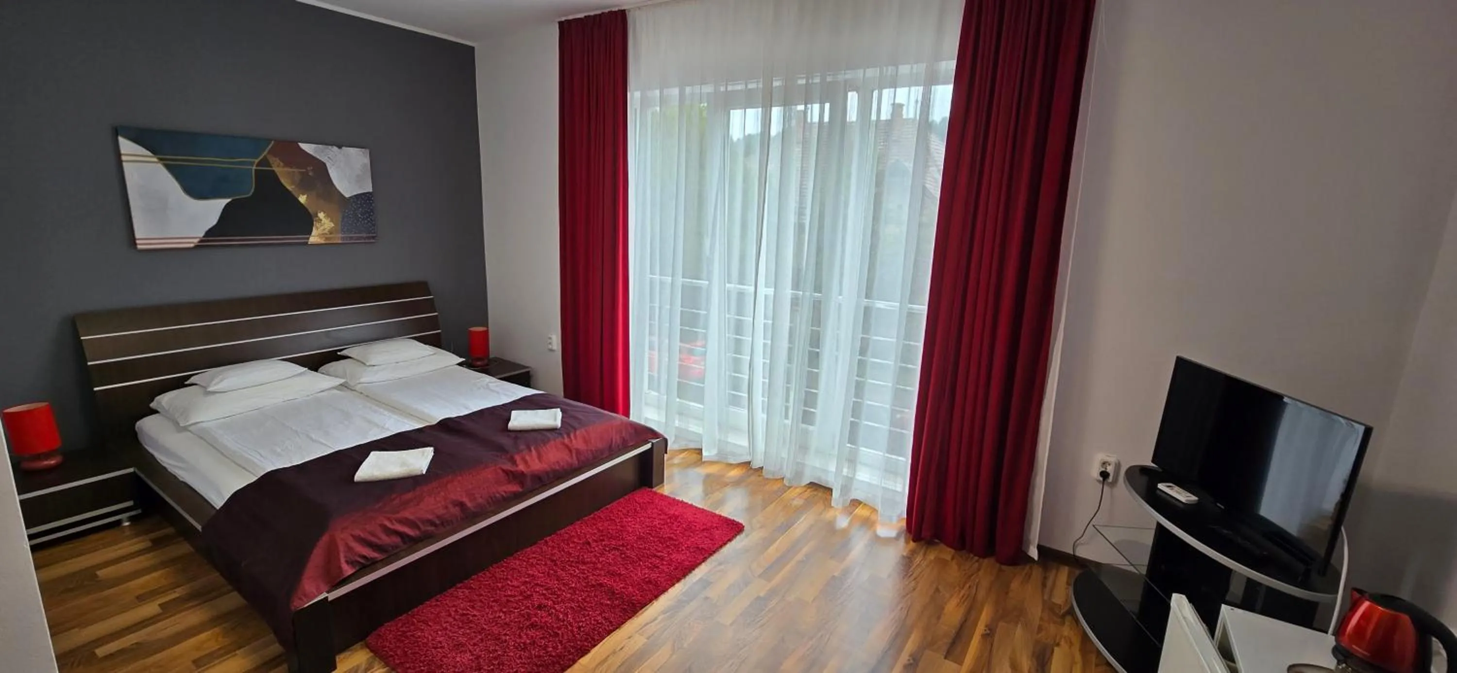 Communal lounge/ TV room, Bed in Rubin