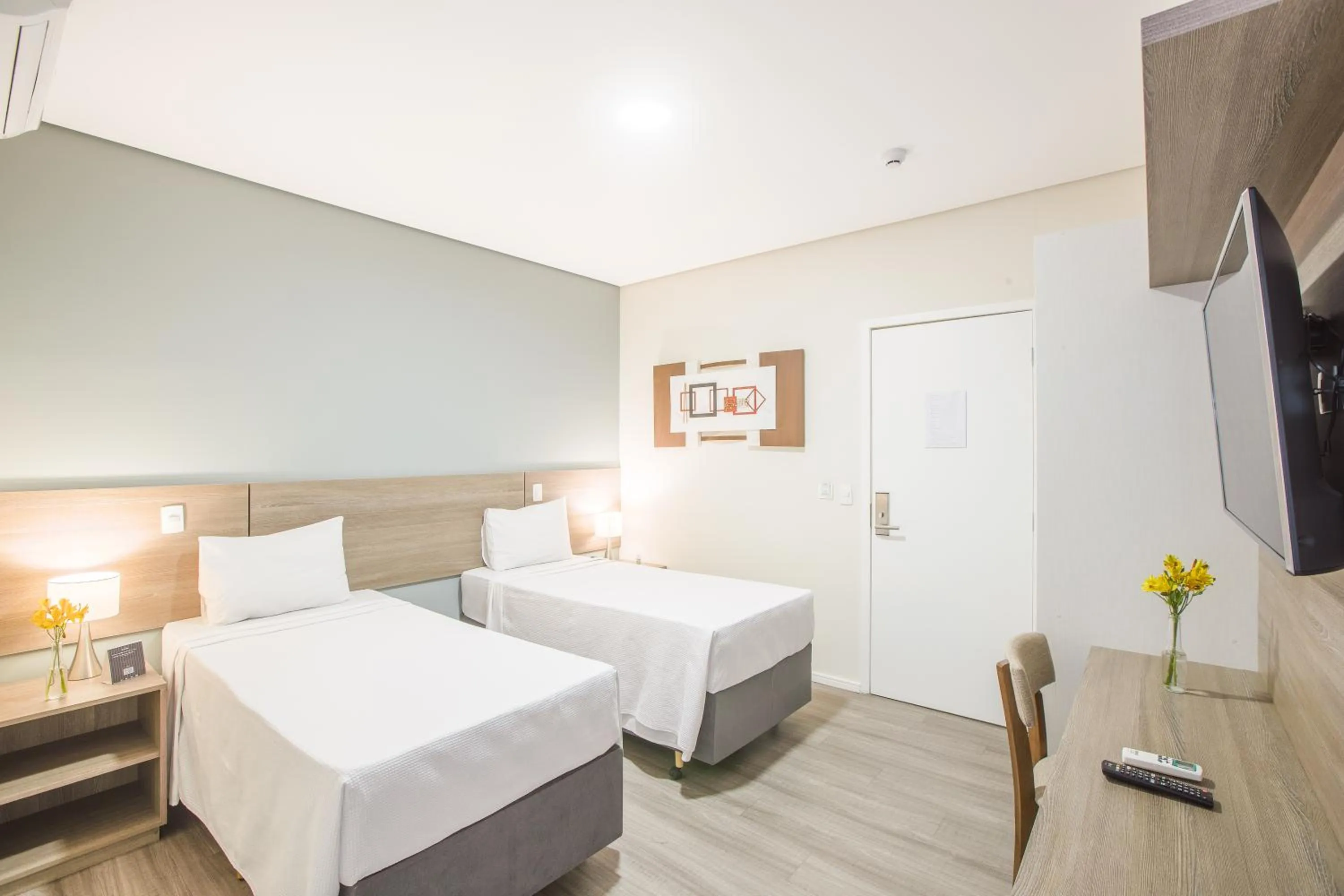 Bed in Sumaré Park Hotel