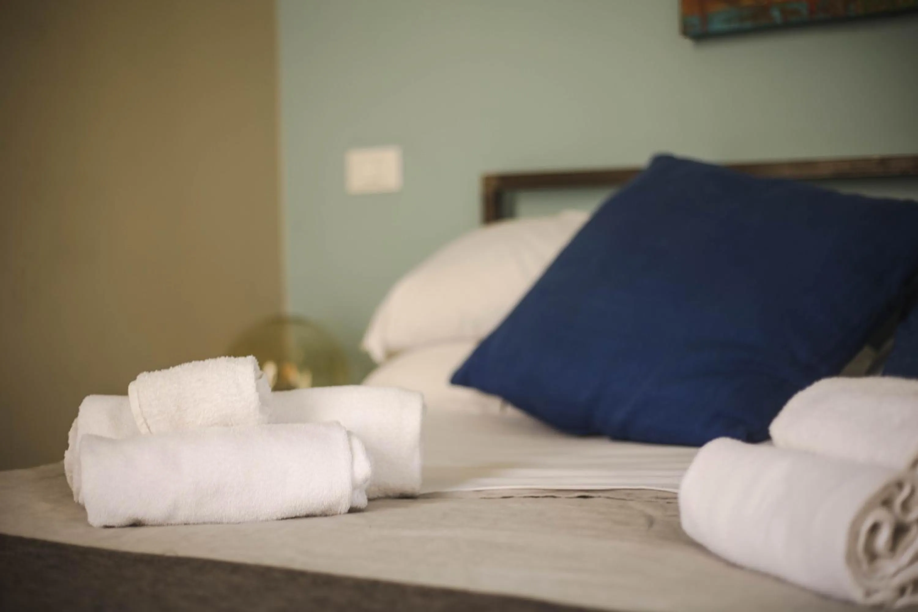 towels, Bed in 4 Balconi rooms-Boutique B&B