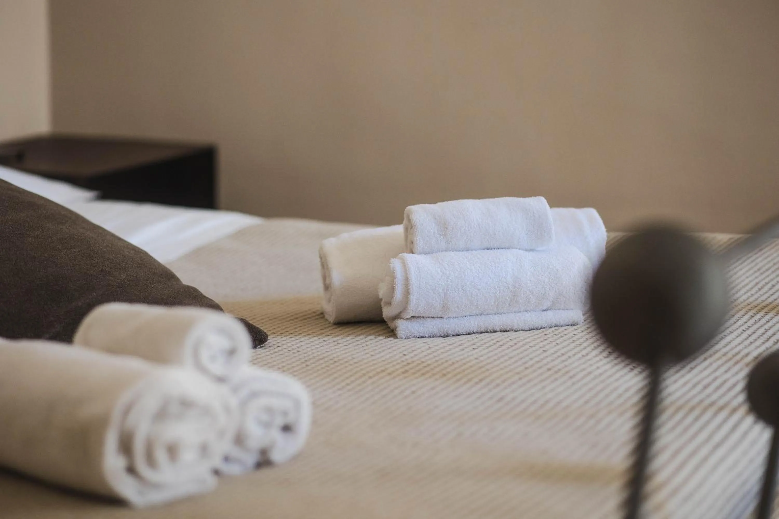 towels, Bed in 4 Balconi rooms-Boutique B&B