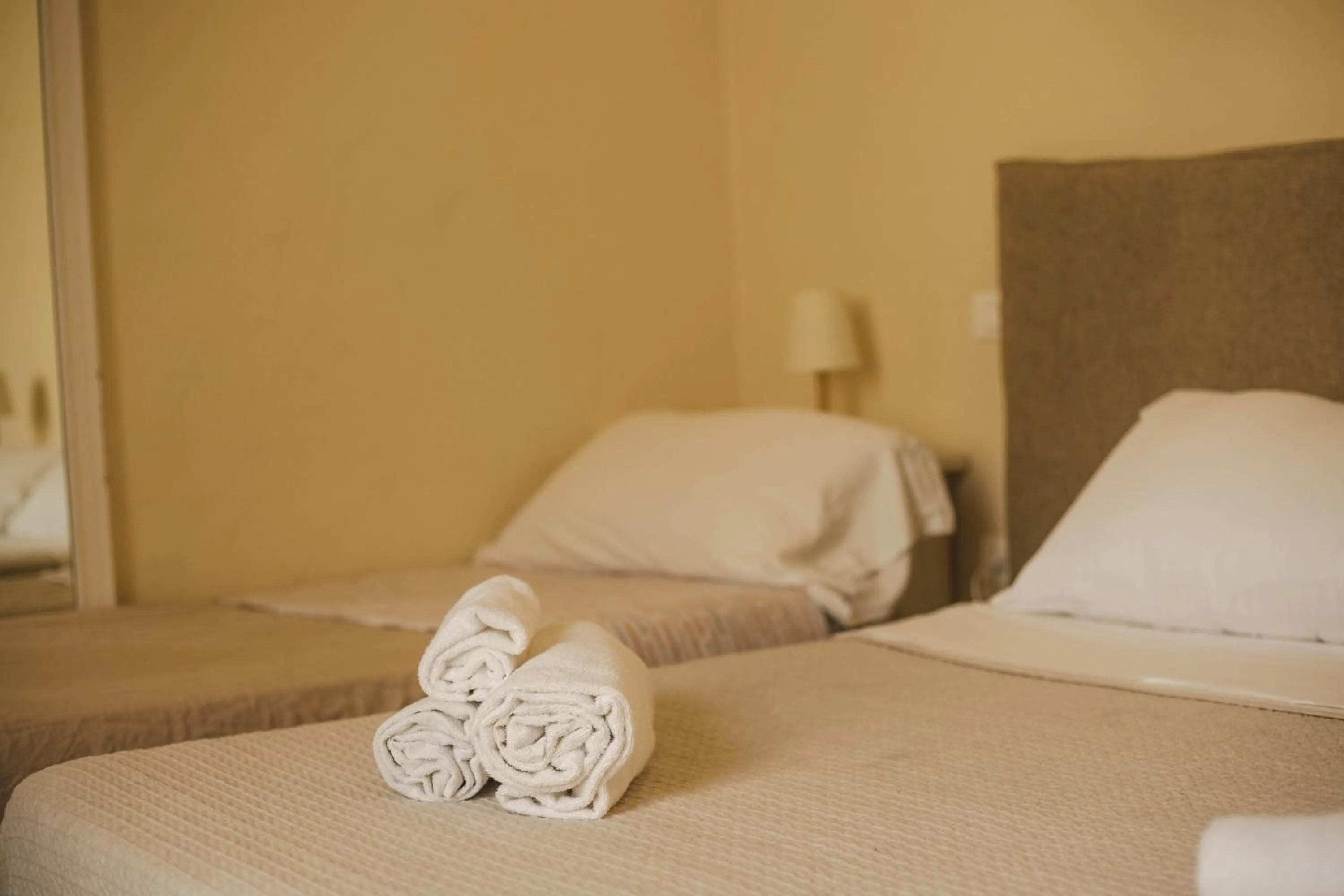 towels, Bed in 4 Balconi rooms-Boutique B&B