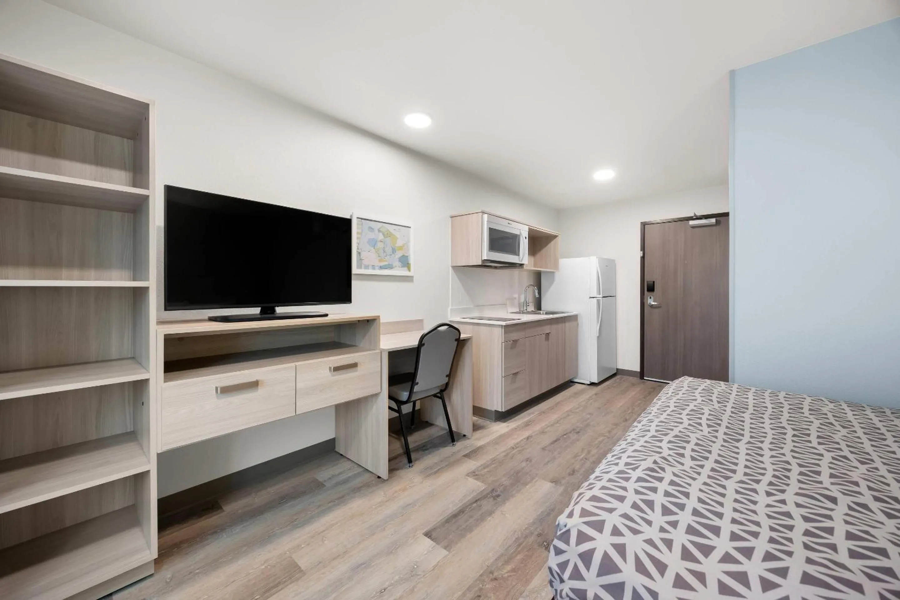 Bed in WoodSpring Suites Medford near I-5