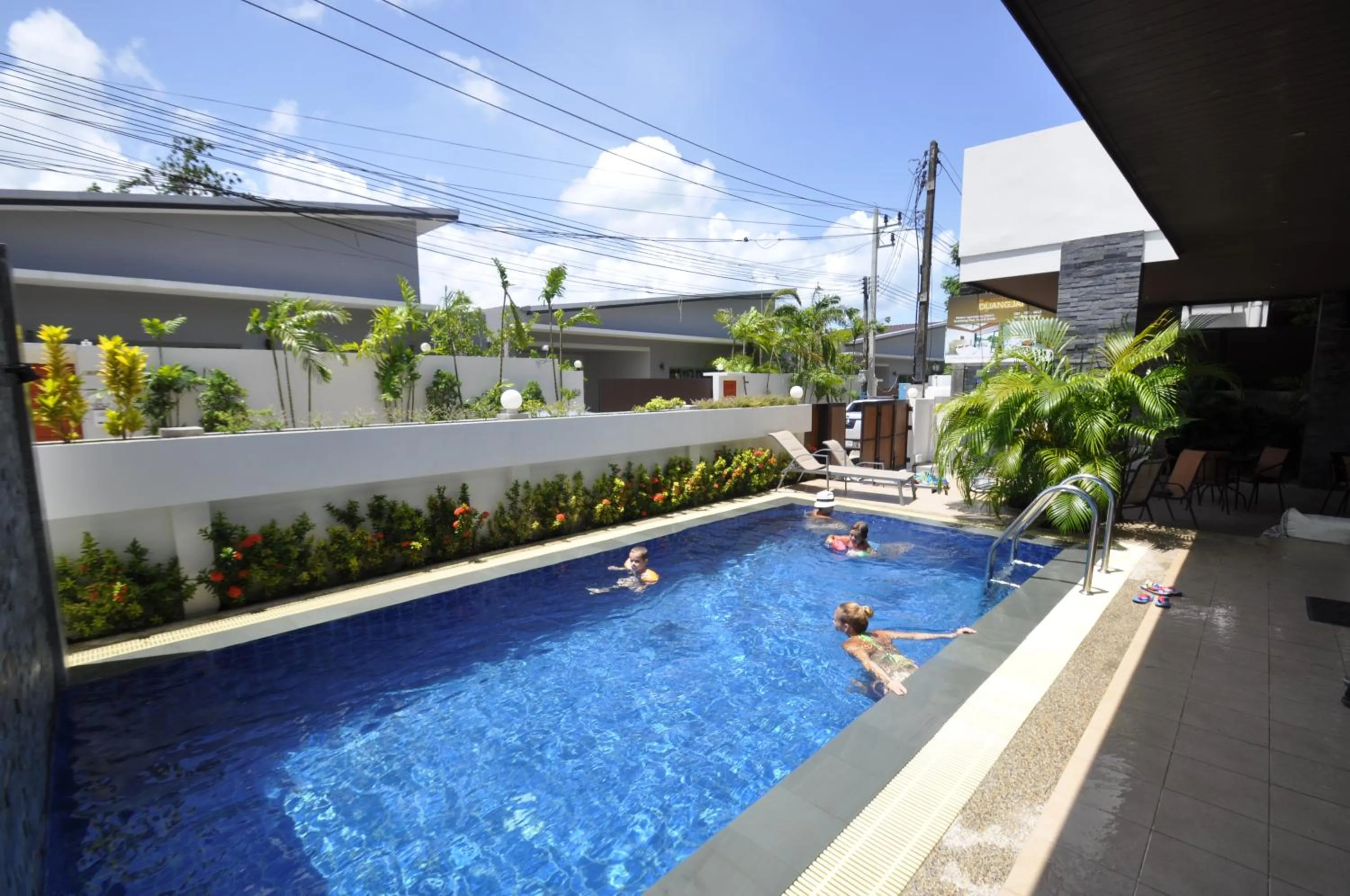 Swimming pool in Duangjai Residence, Rooms & Apartments