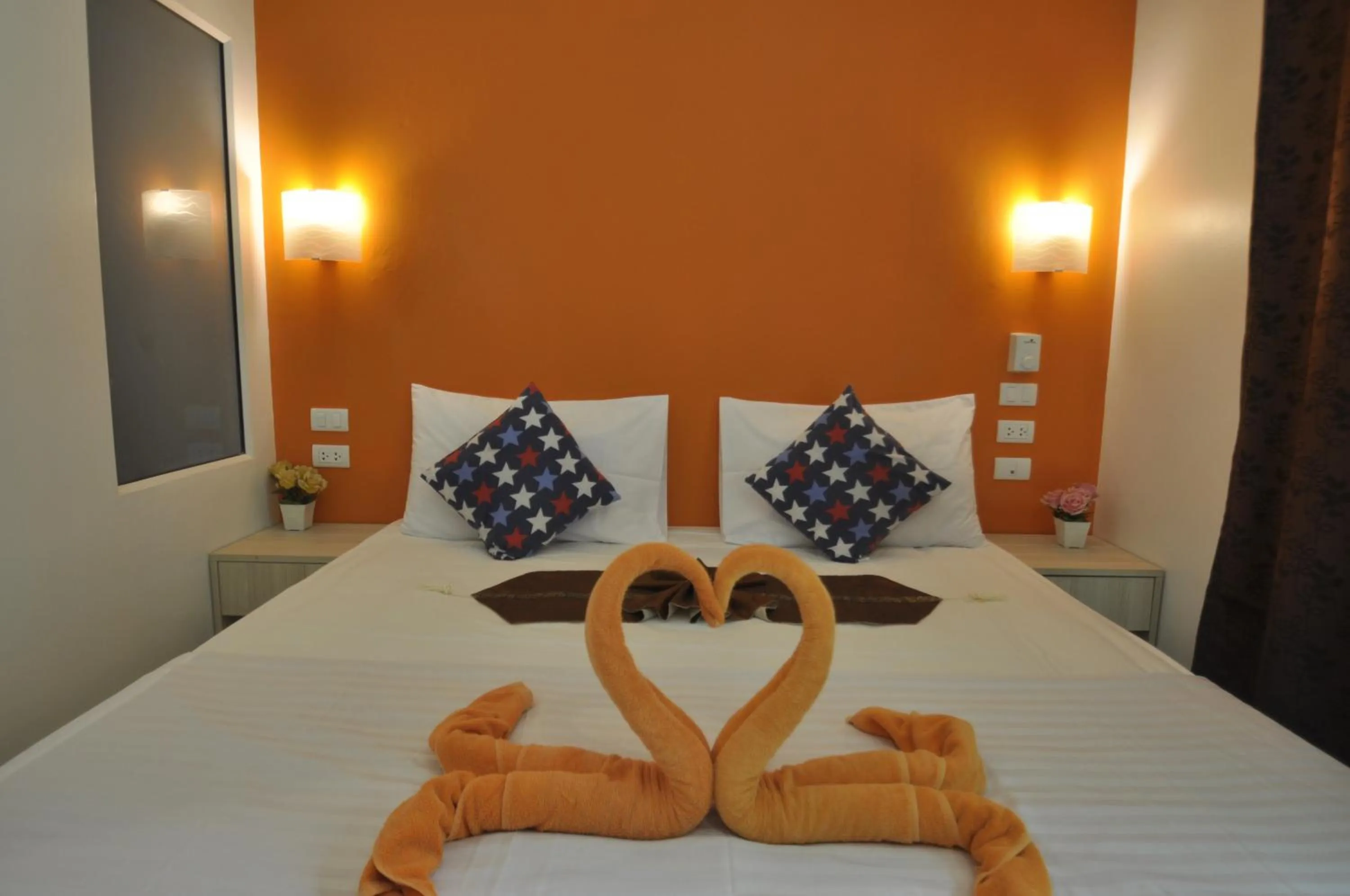 Bed in Duangjai Residence, Rooms & Apartments