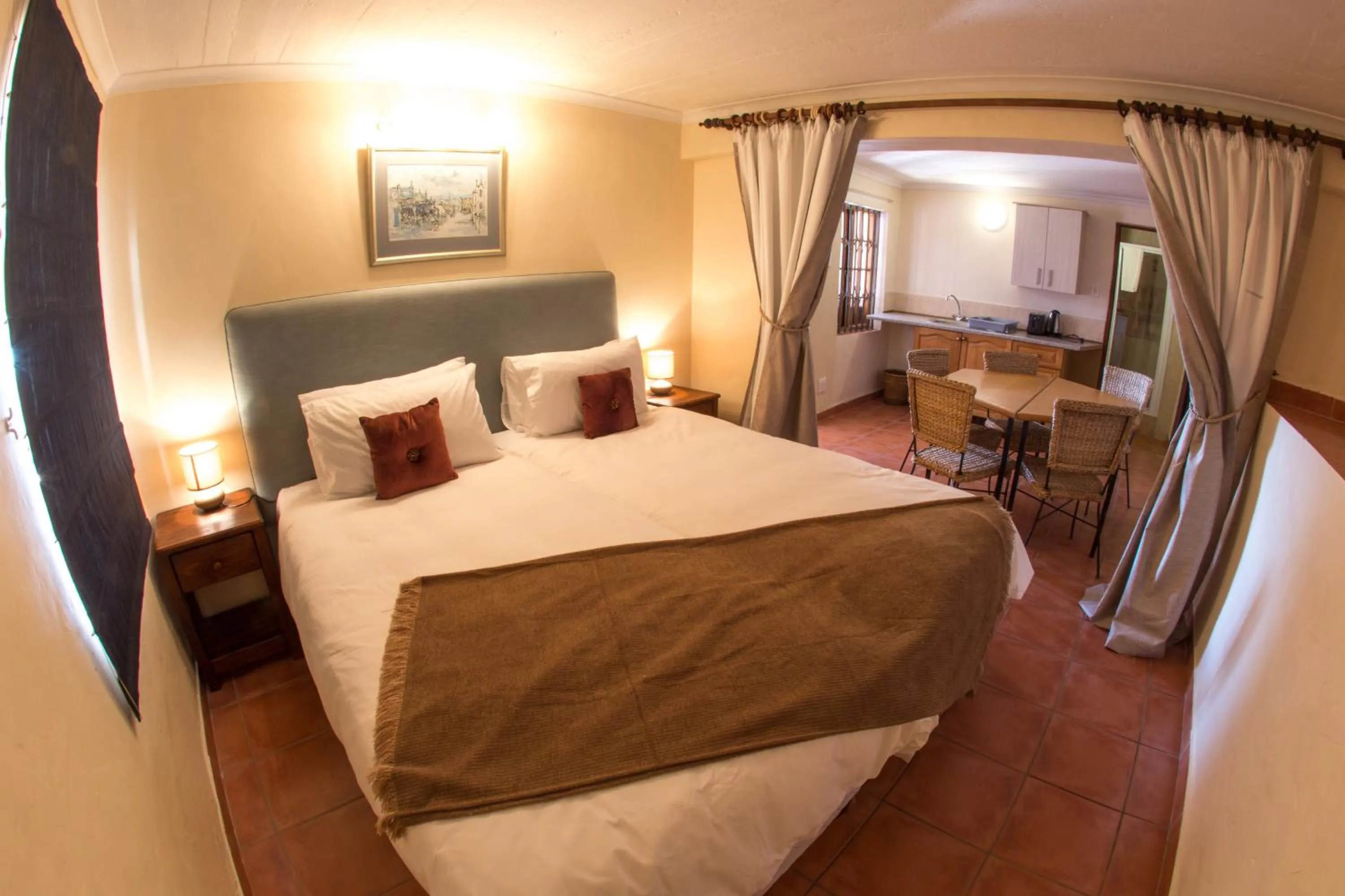 Bed in Winelands Villa Guesthouse and Cottages