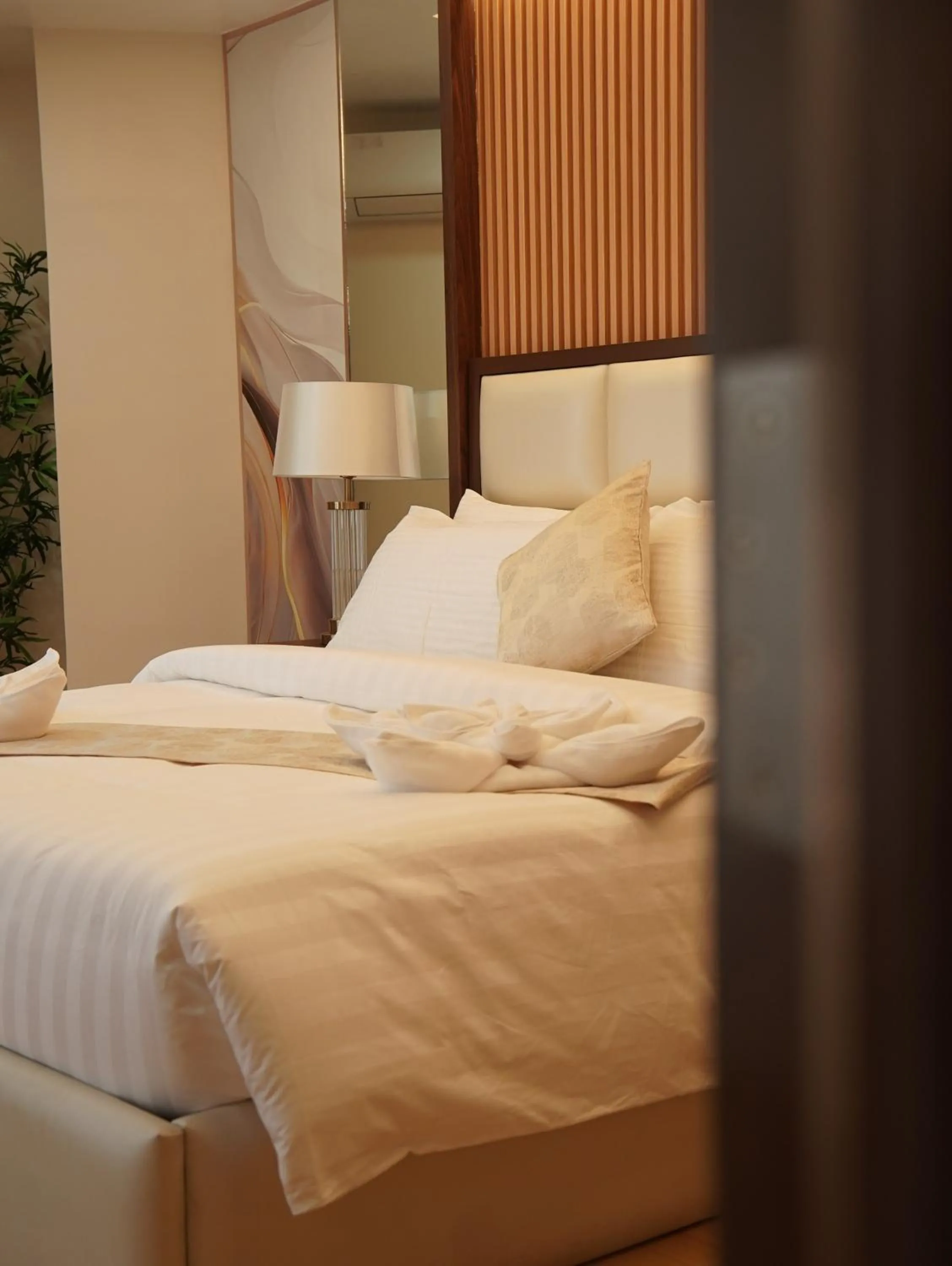 Bed in Chateau de Maisons Suites