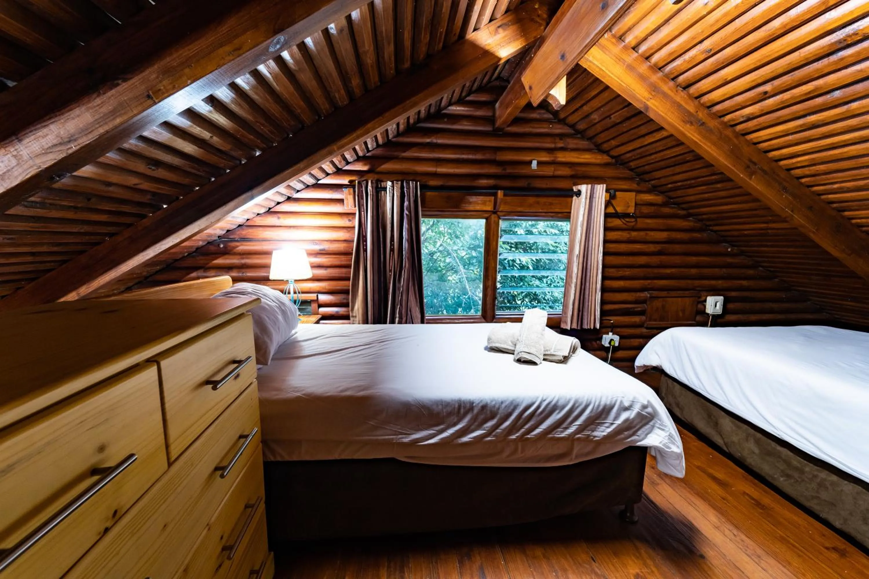 Photo of the whole room, Bed in Mtunzini Forest Lodge Self Catering Resort