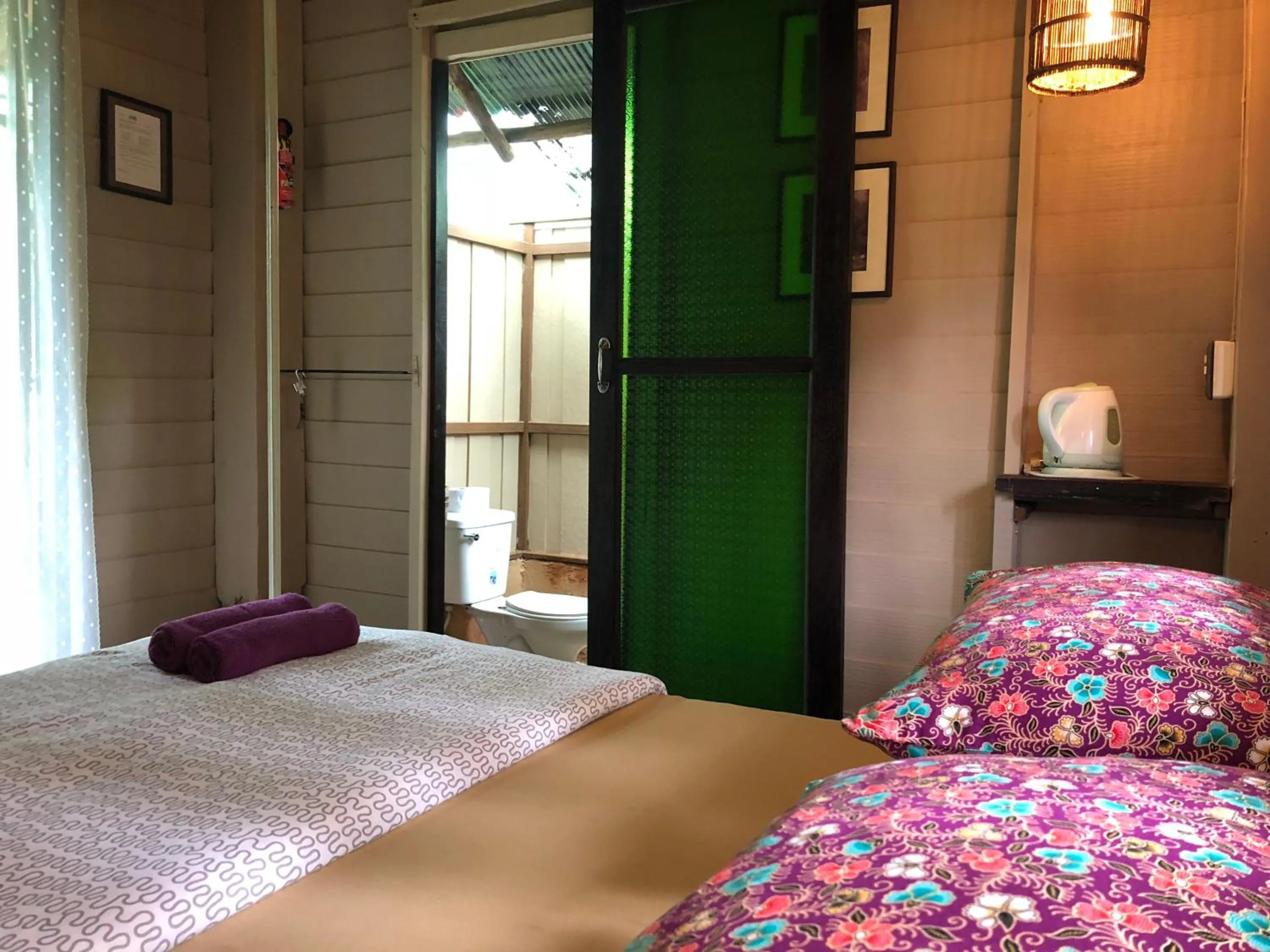 Bed in Bannamhoo Bungalows
