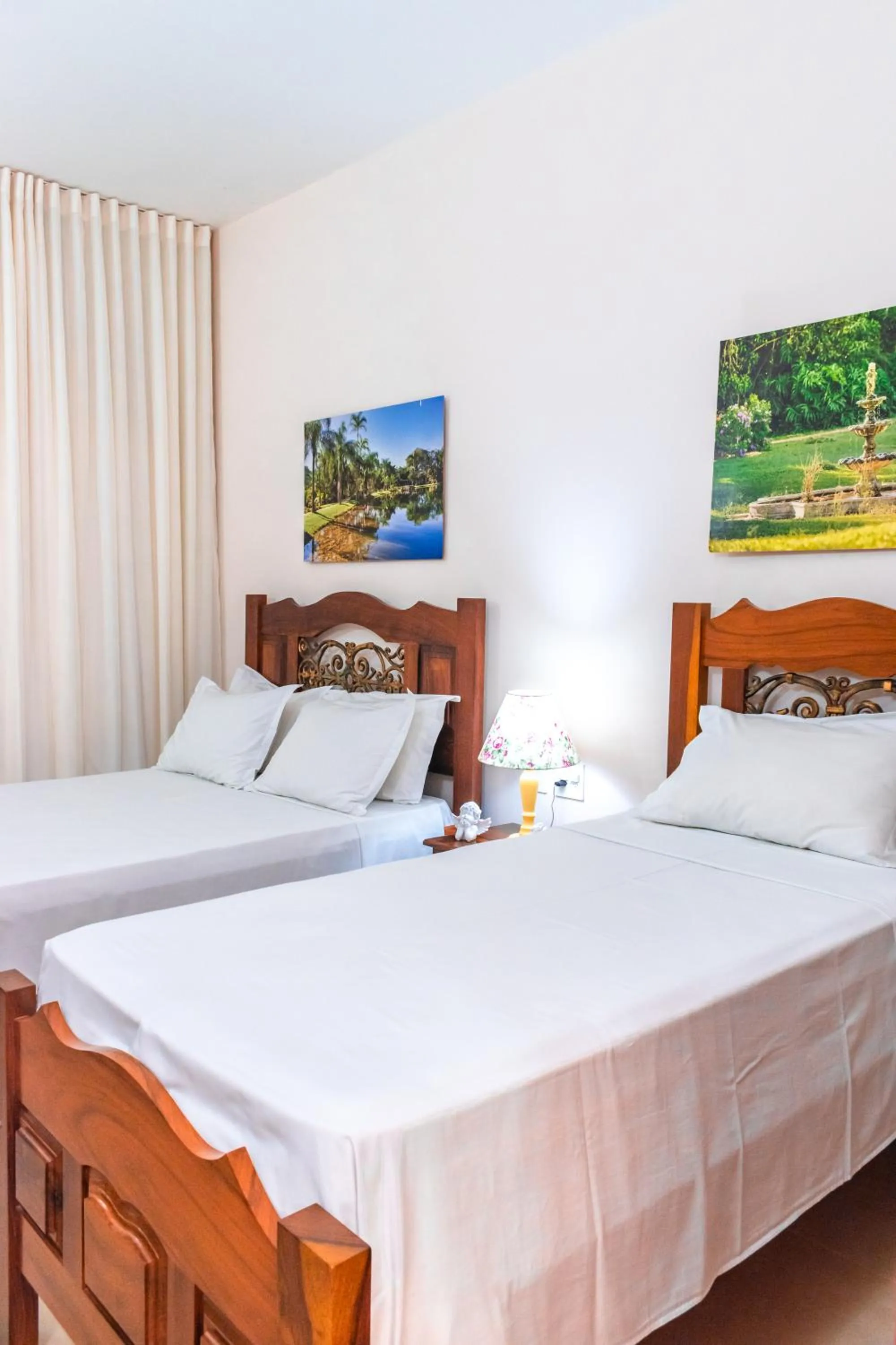 Bed in BellaMinas Pousada