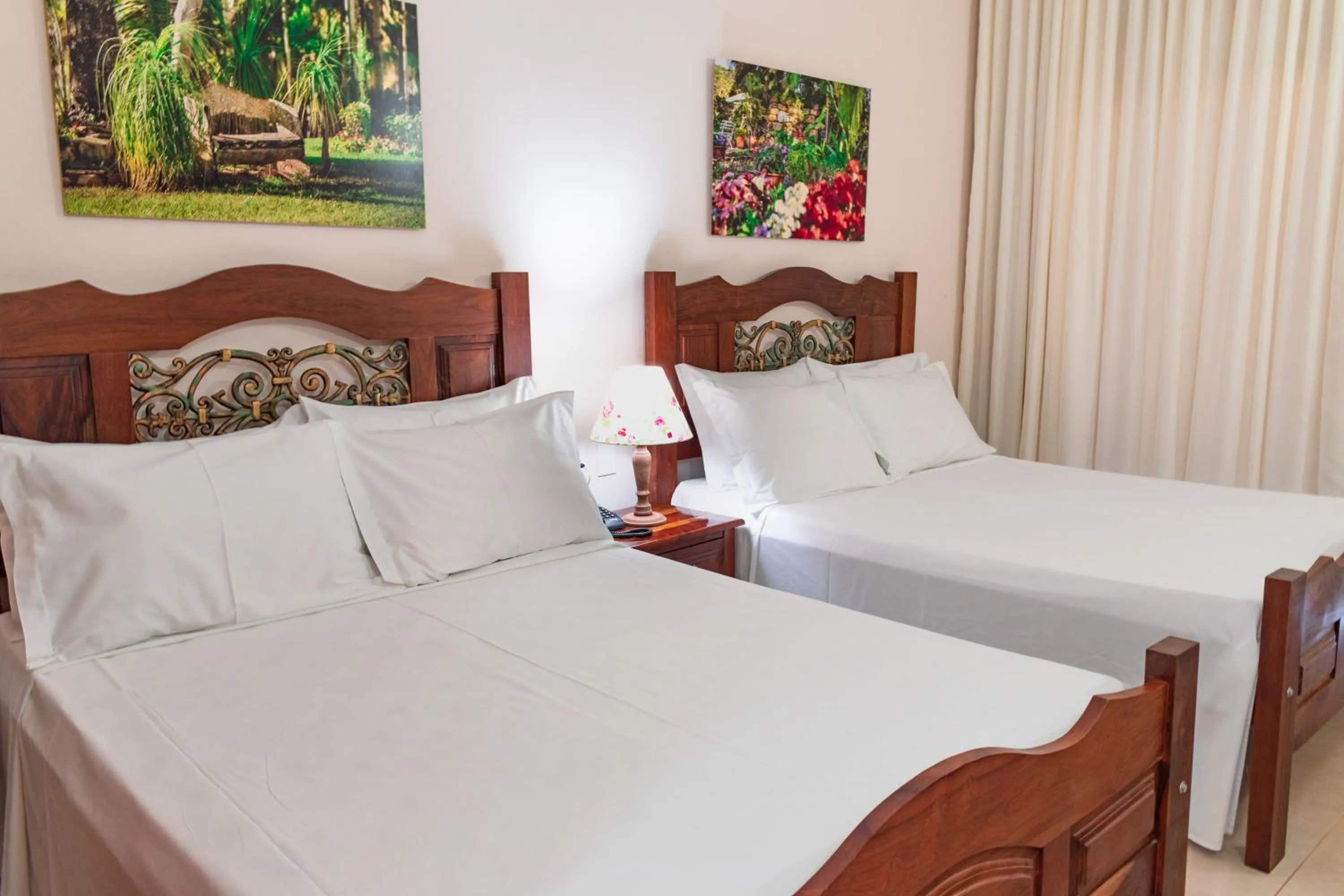 Bed in BellaMinas Pousada