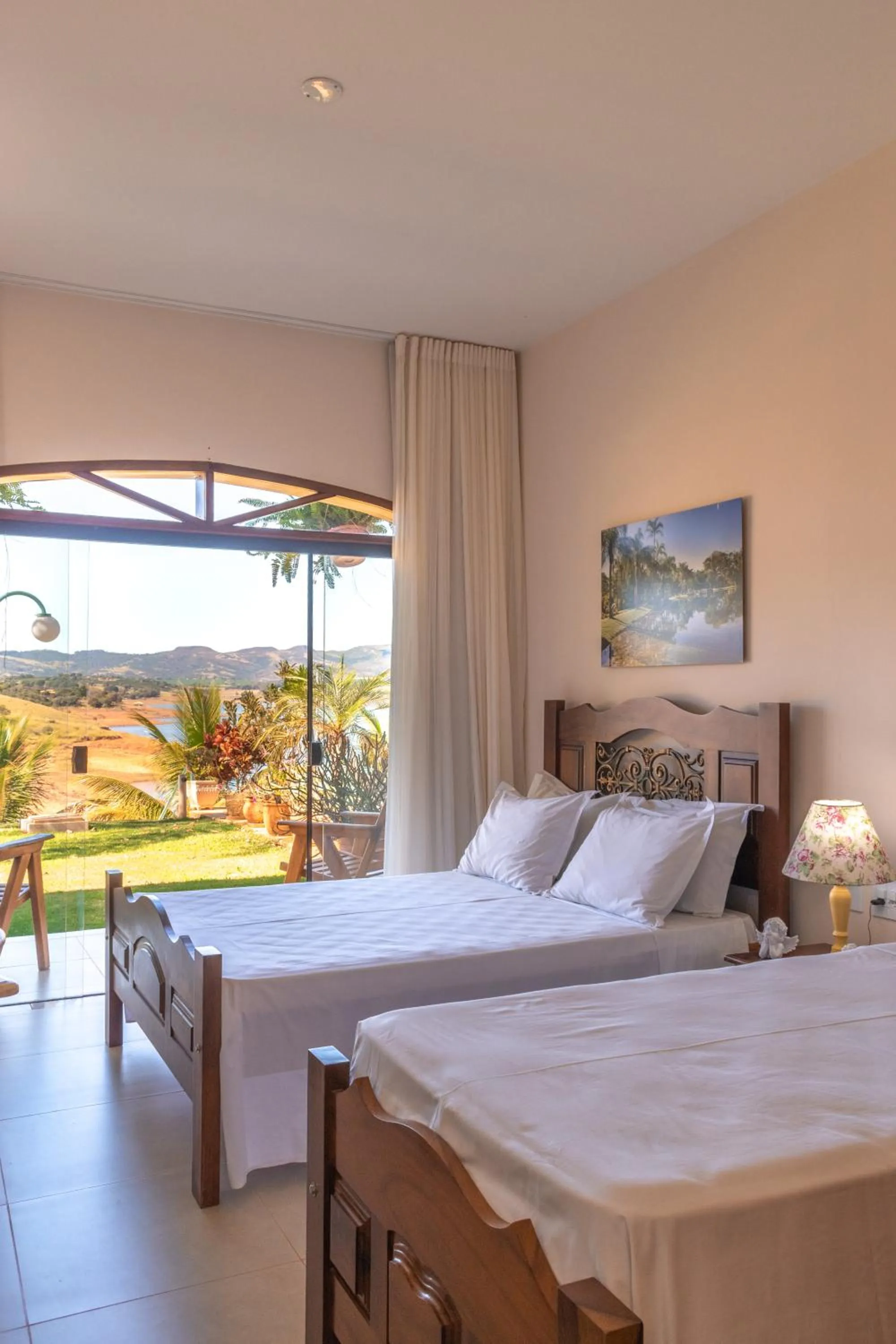 Bed in BellaMinas Pousada