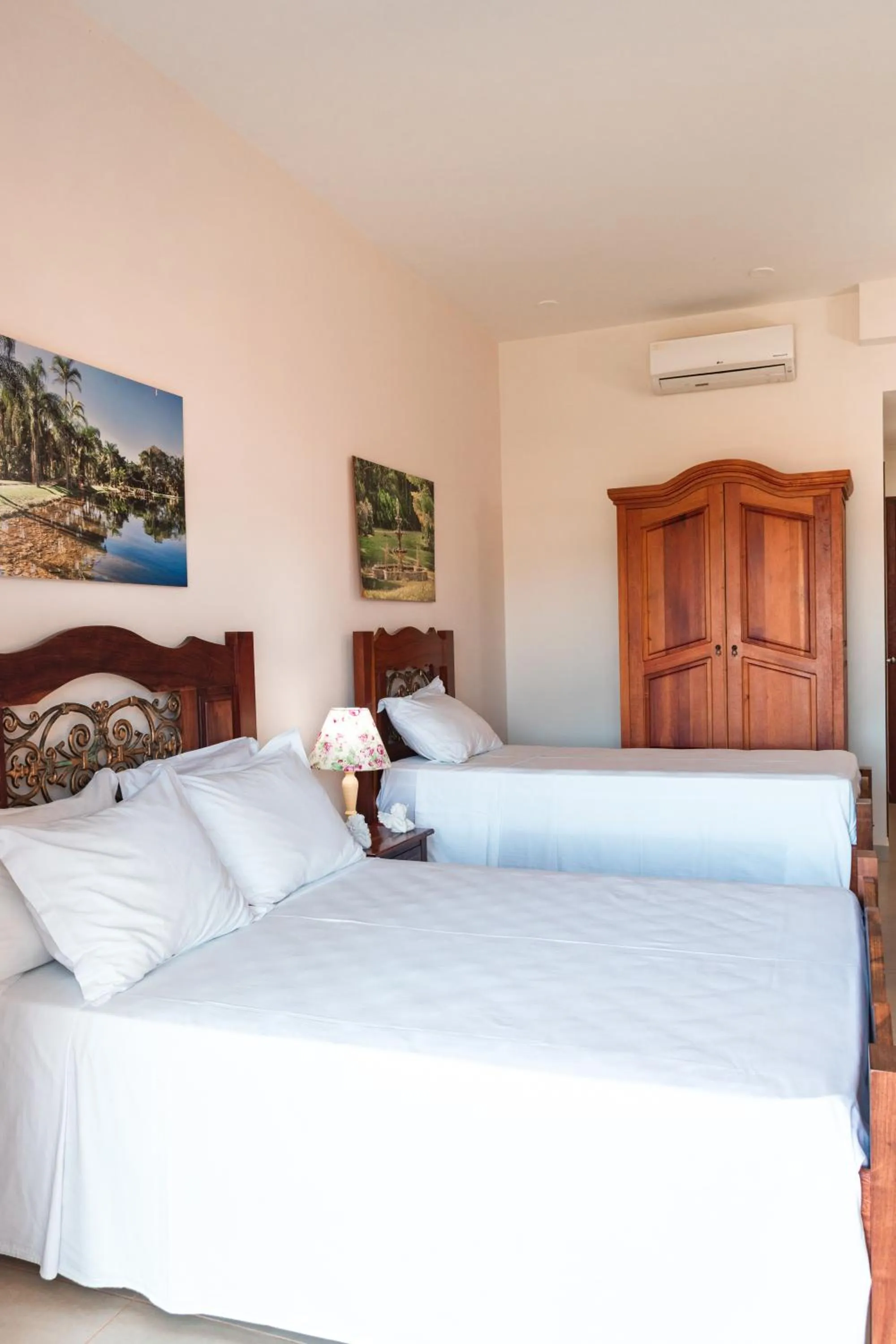 Bed in BellaMinas Pousada