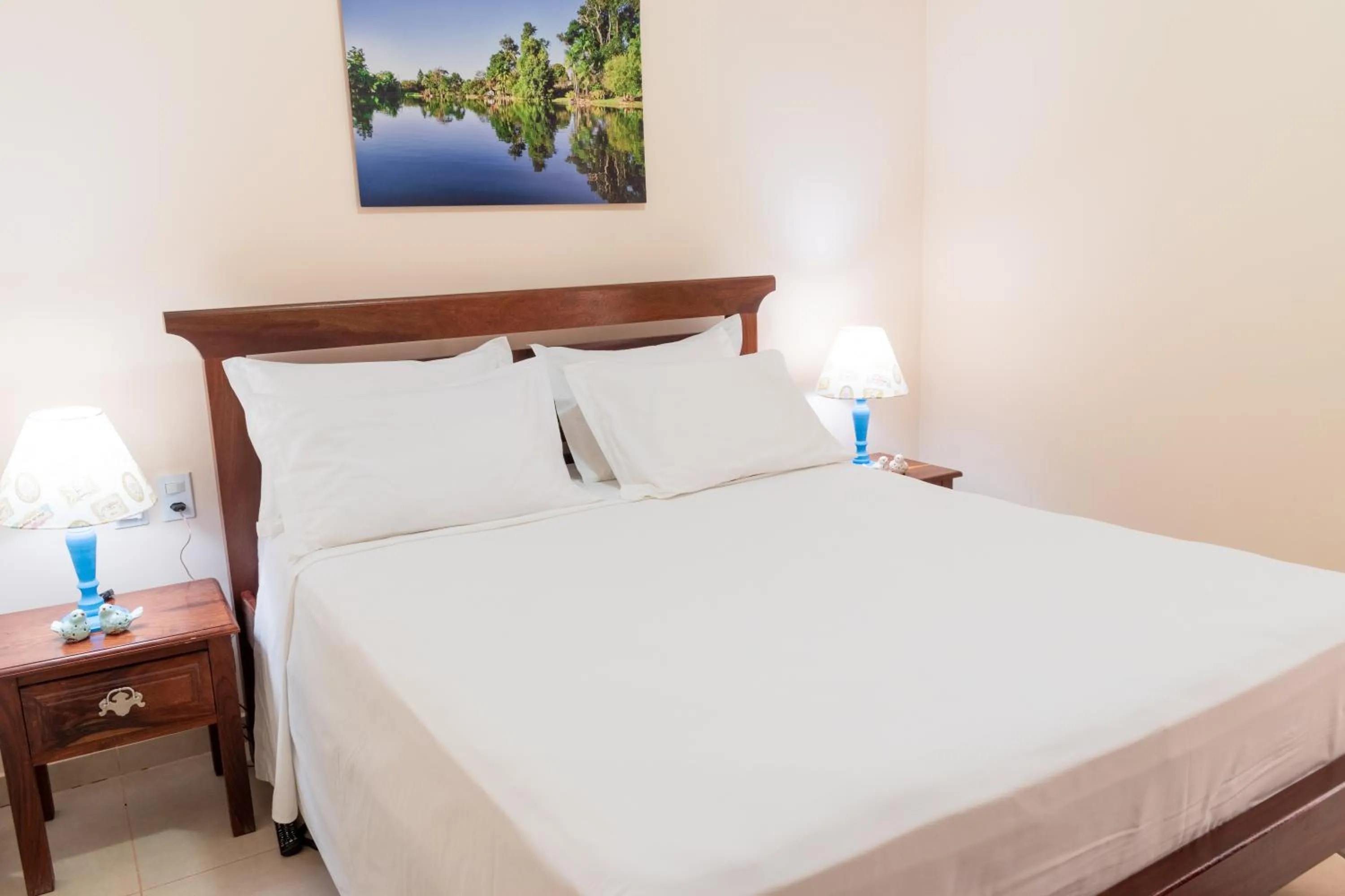 Bed in BellaMinas Pousada