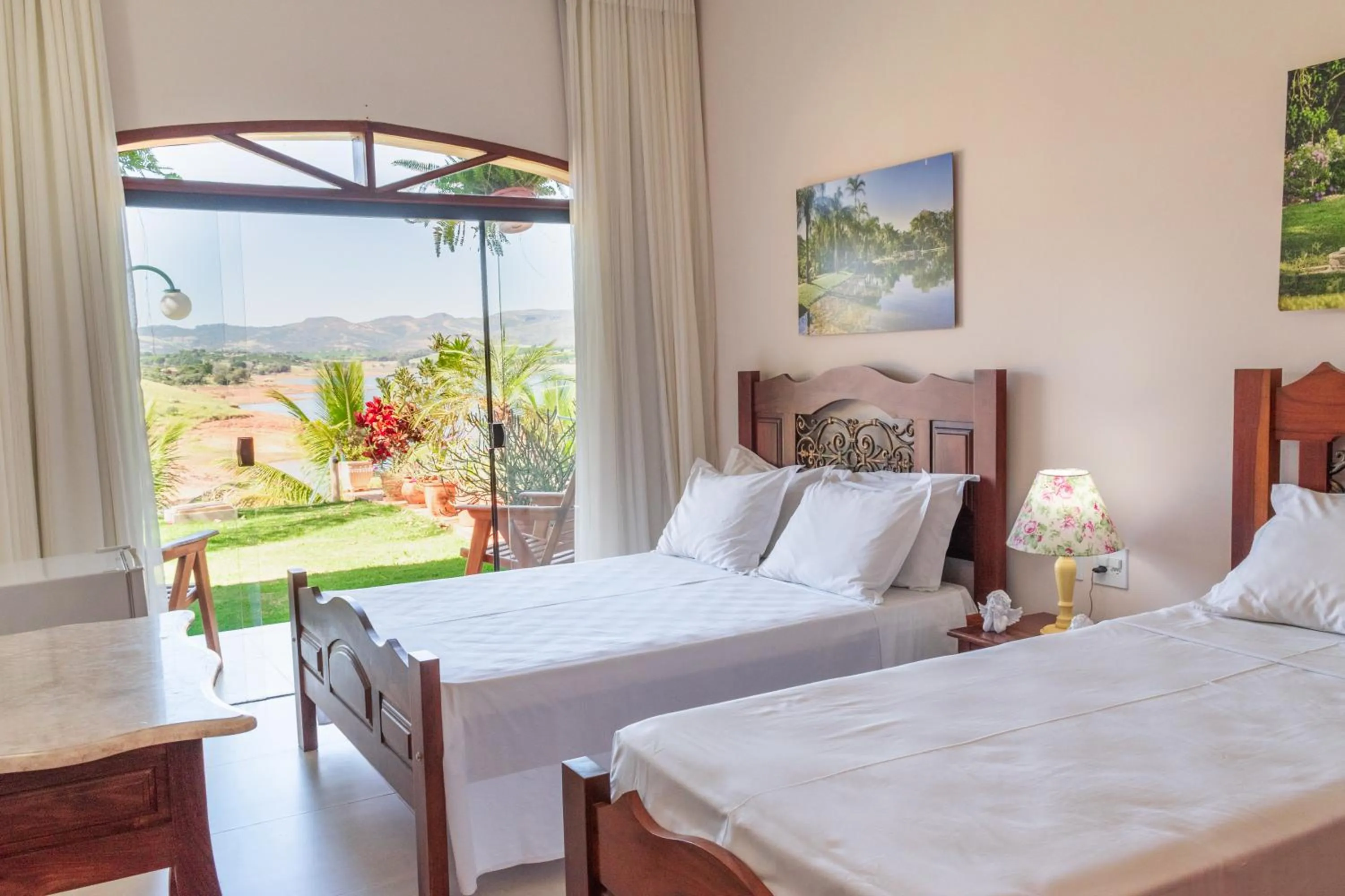 Bed in BellaMinas Pousada