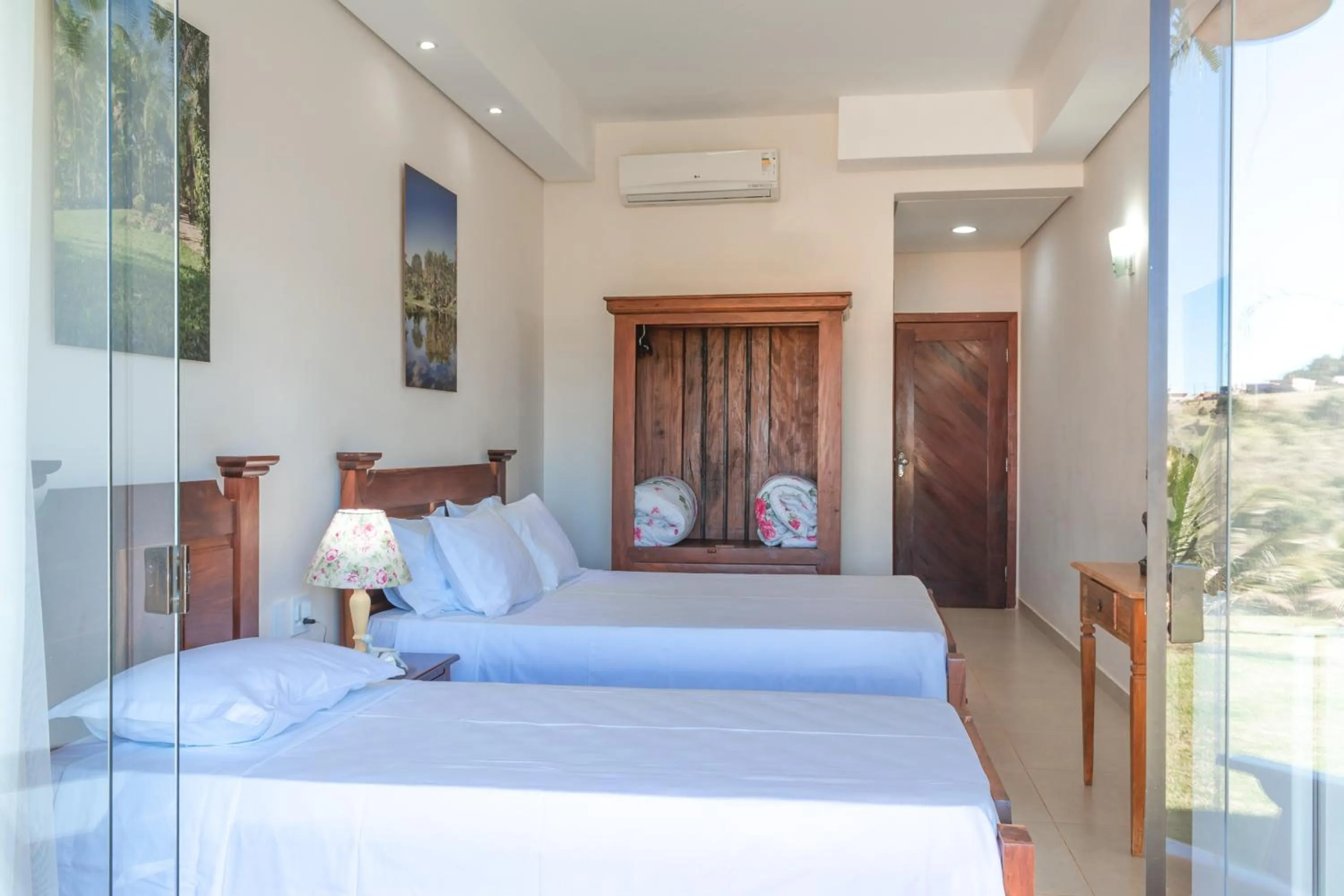 Bed in BellaMinas Pousada