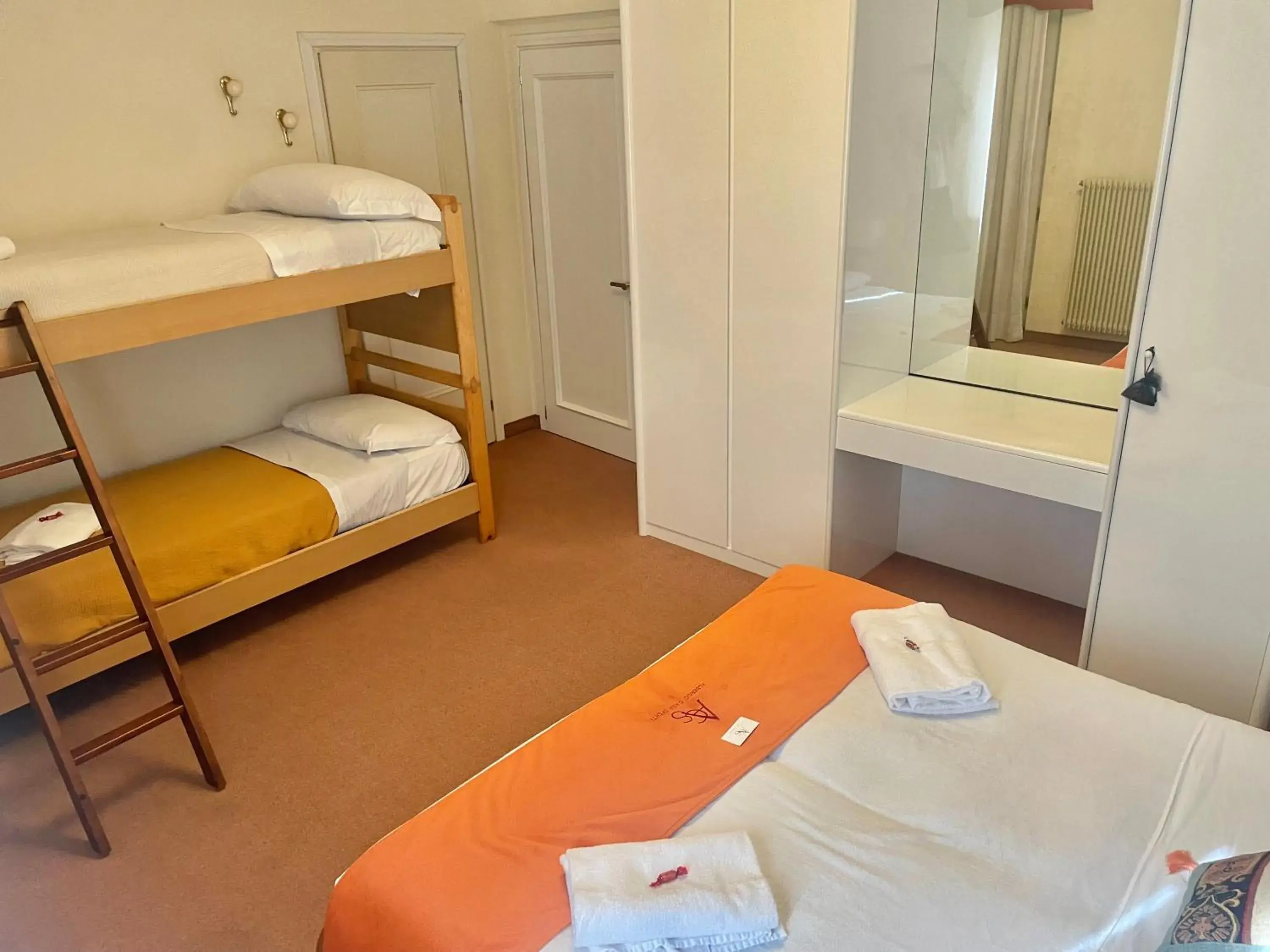 Classic Quadruple Room in Albergo Casa Sperti Classic Quadruple Room in Albergo Casa Sperti