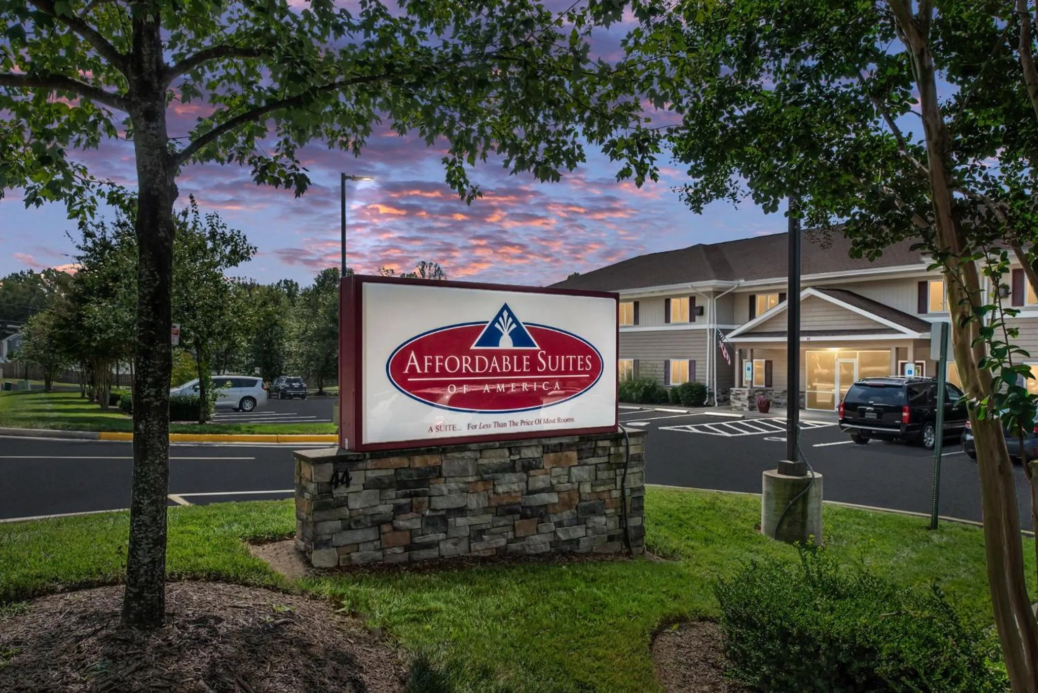 Property logo or sign in Affordable Suites of America Stafford Quantico