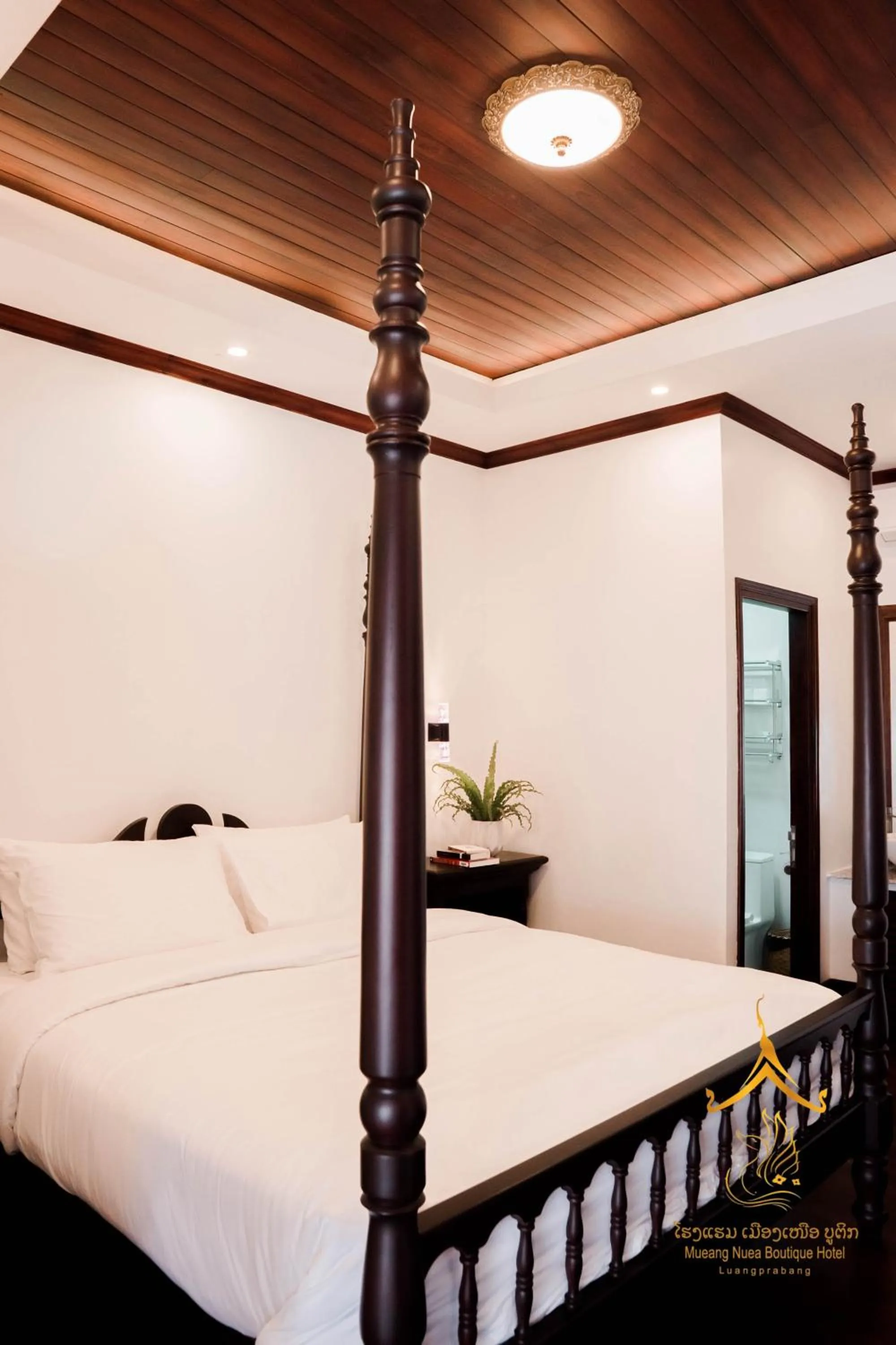 Bed in Mueang Nuea Boutique Hotel